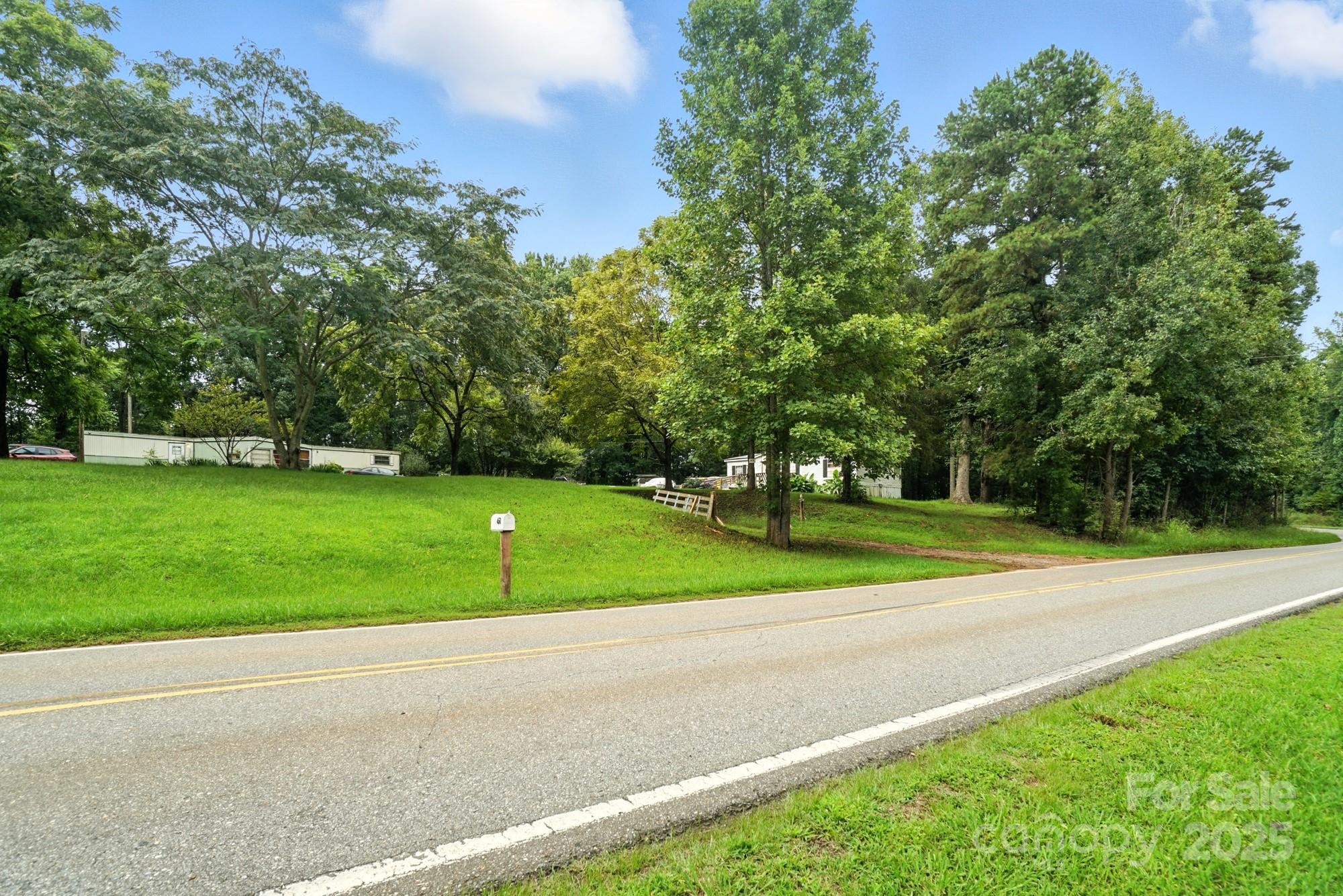Another view of subject street and view of lot - 450 Dixon School Road, Kings Mountain