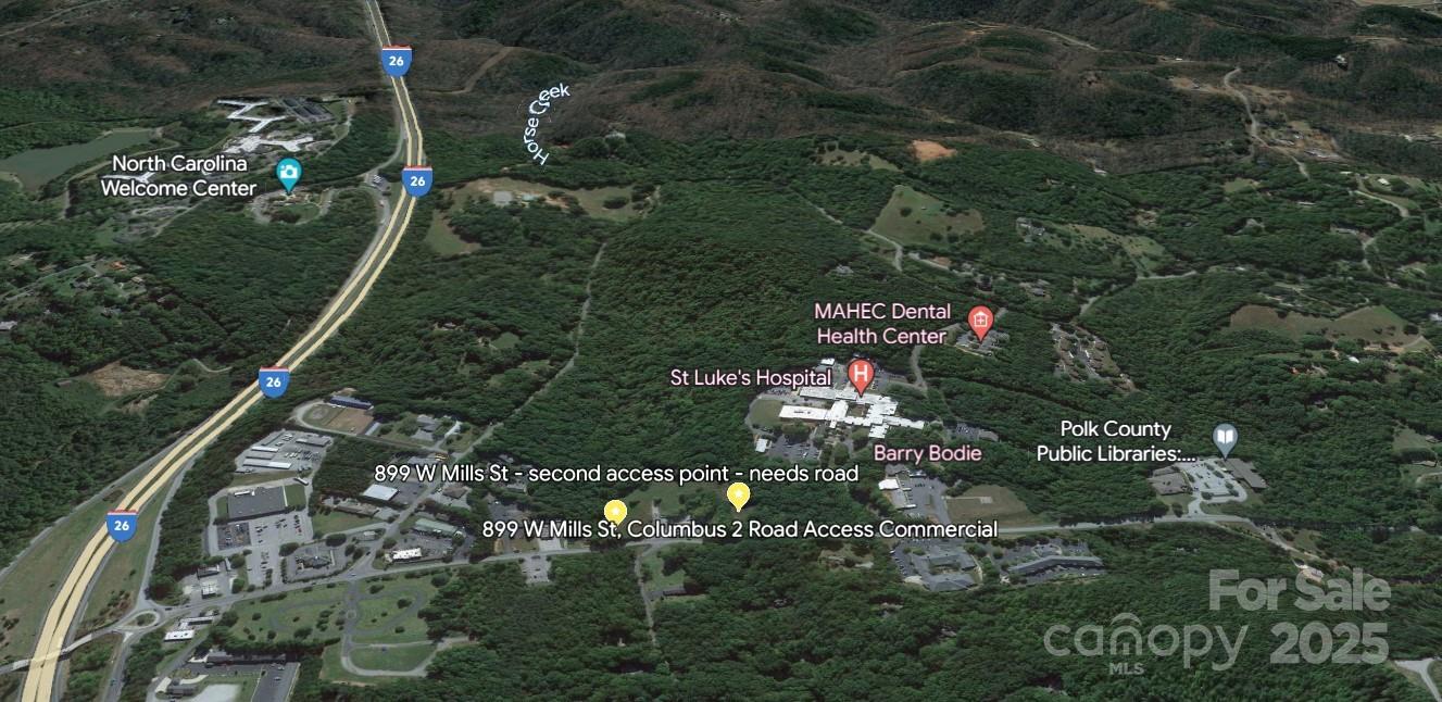 Aerial from Google Earth showing location; upper and lower entrance - HIGH Traffic Road! (Coffee Shop, not included, in front middle of property) - 899 W Mills Street, Columbus