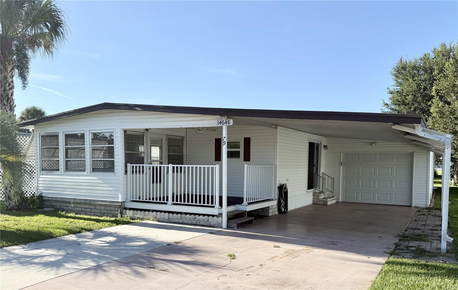 Front View of the Home - 34648 SWEETPEA LN, ZEPHYRHILLS