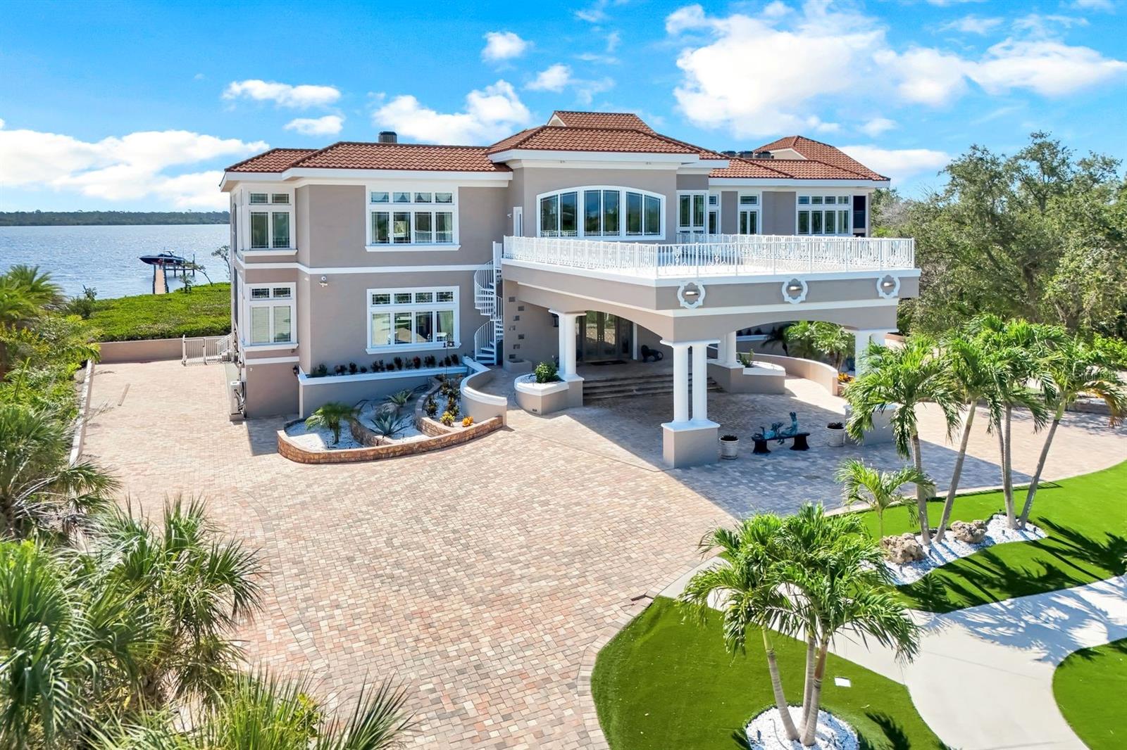 Elegant front entry with car port in circular driveway - 7159 MANASOTA KEY RD, ENGLEWOOD
