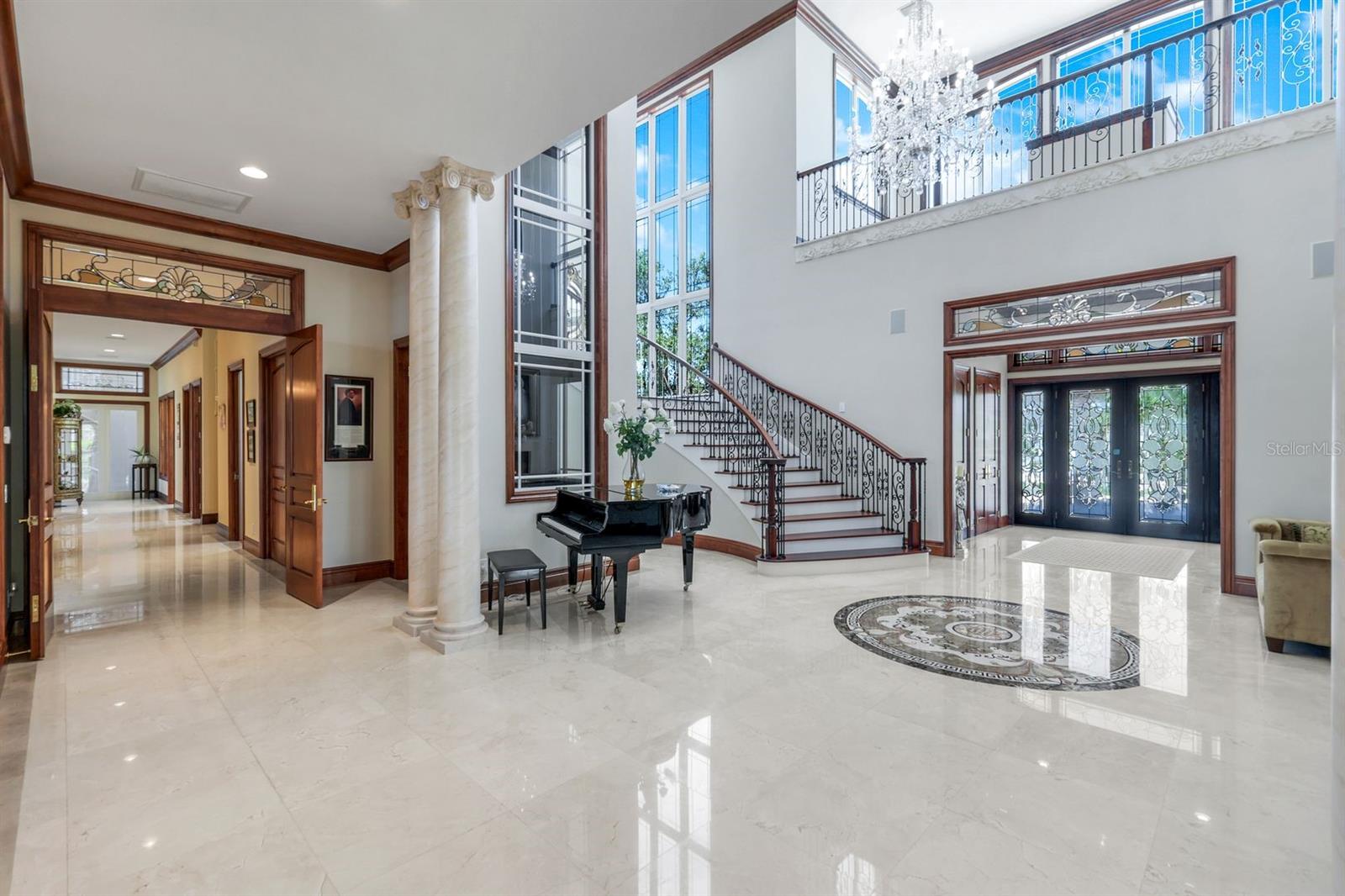 front foyer with glass elevator that acesses all floors fron garage to roof top - 7159 MANASOTA KEY RD, ENGLEWOOD