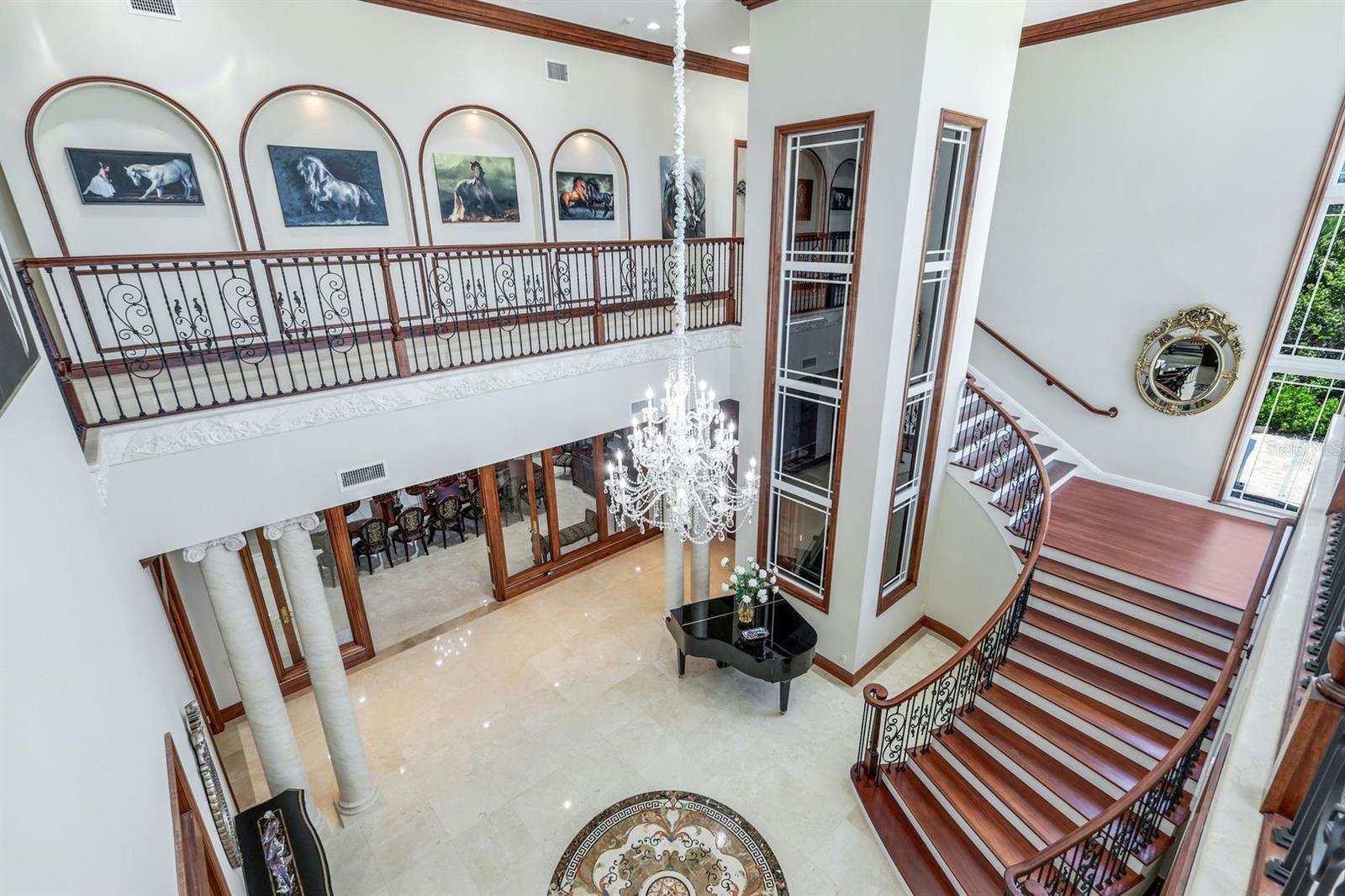 elegant staircase and glass elevator - 7159 MANASOTA KEY RD, ENGLEWOOD