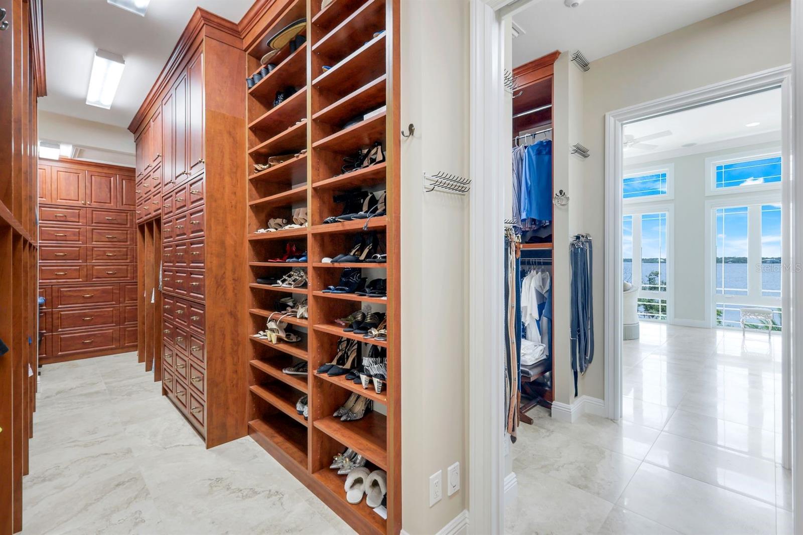 primary bedroom custom closet - 7159 MANASOTA KEY RD, ENGLEWOOD