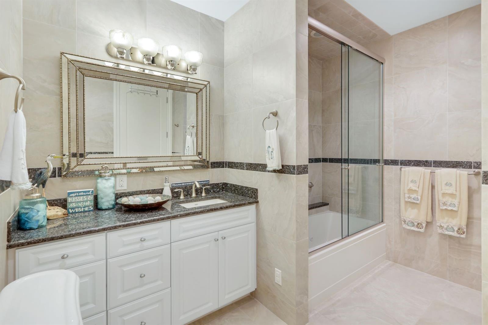 guest bath ensuite - 7159 MANASOTA KEY RD, ENGLEWOOD