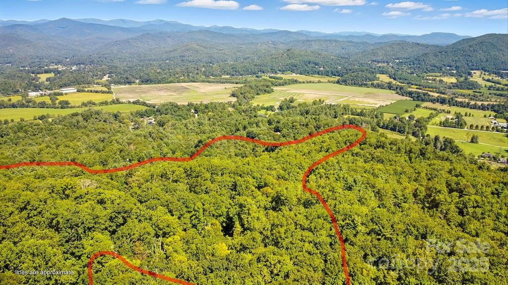 Enjoy privacy on 14.97 acres. The property has a creek running through it. Property lines are approximate. - 11 Reserve Road, Pisgah Forest