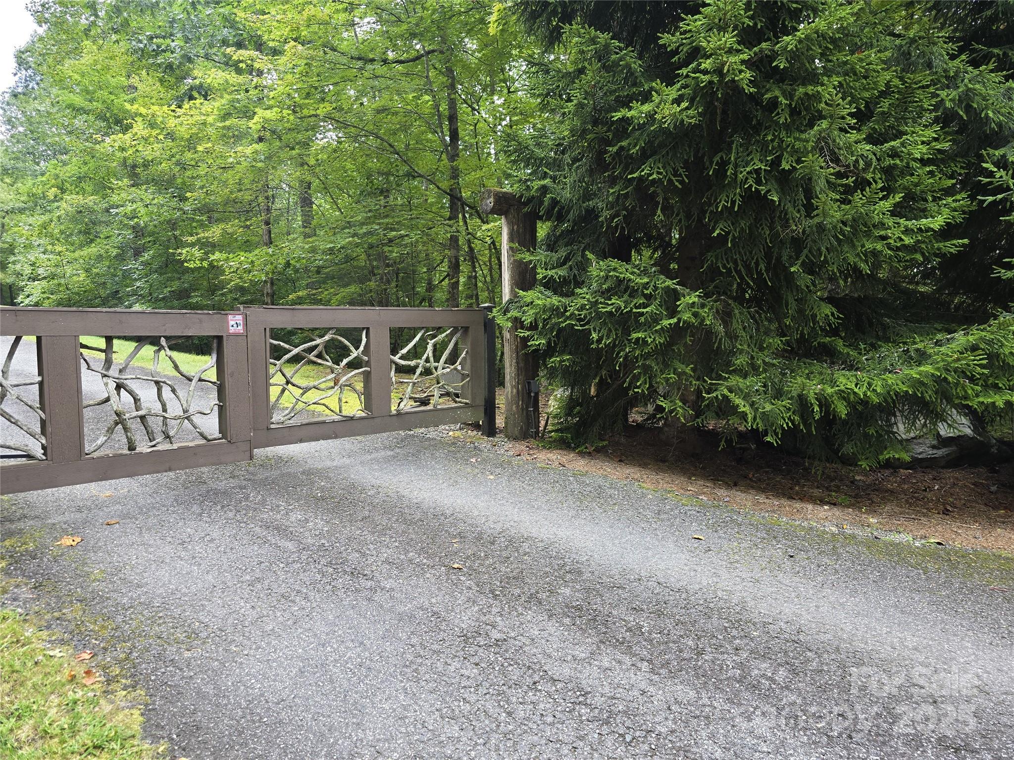 There are three different gated access points for The Reserve each with security cameras. - 11 Reserve Road, Pisgah Forest