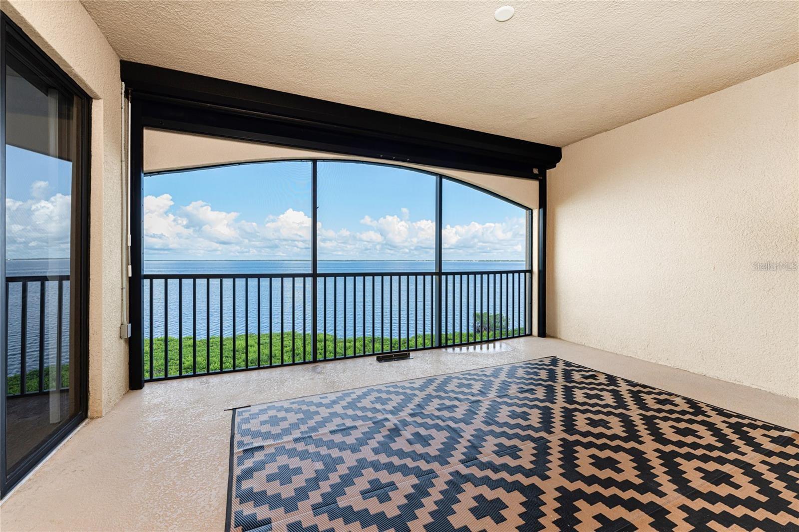 Large lanai has a view of the harbor and has hurricane protection - 85 VIVANTE BLVD #8534, PUNTA GORDA