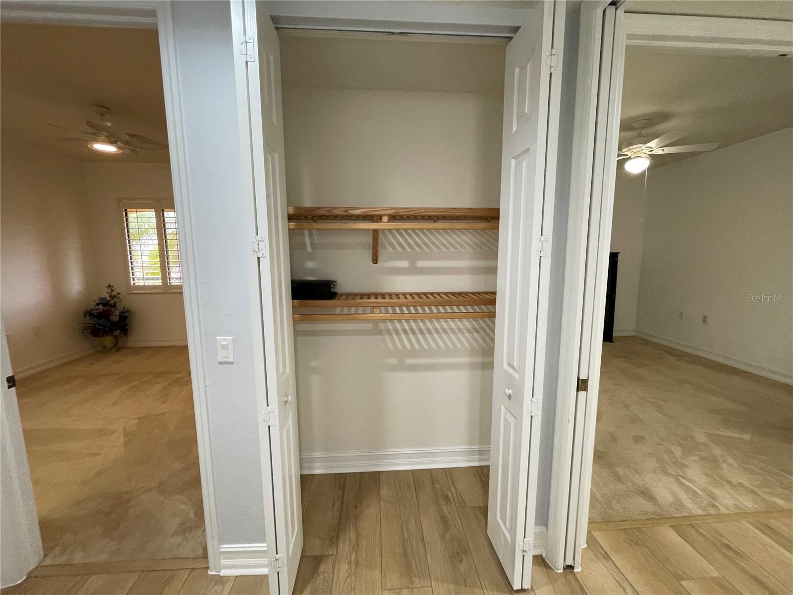 en suite, closet and 3rd bedroom on the guest side of the home. - 85 VIVANTE BLVD #8534, PUNTA GORDA