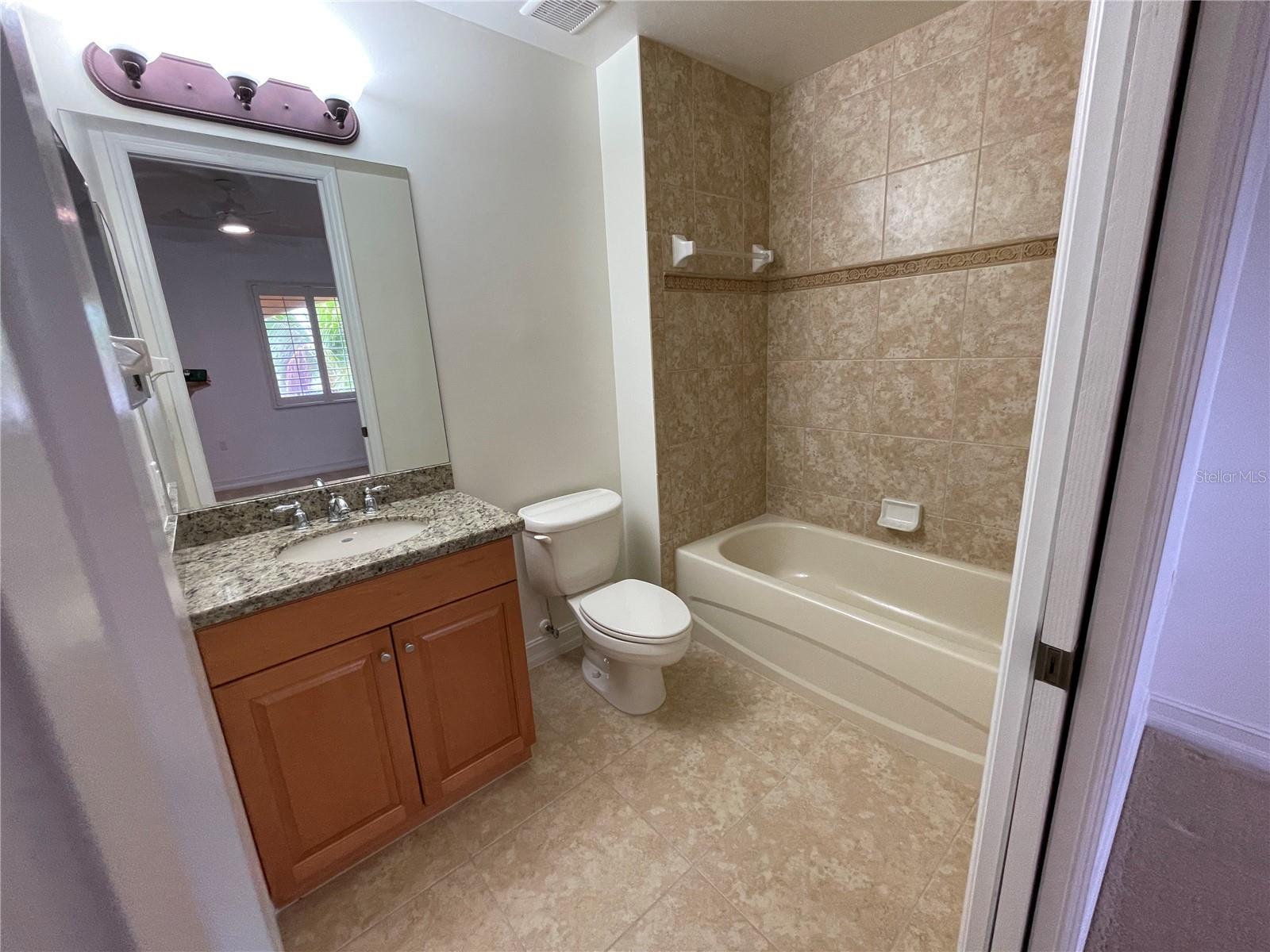 Guest bathroom is across the hall - 85 VIVANTE BLVD #8534, PUNTA GORDA