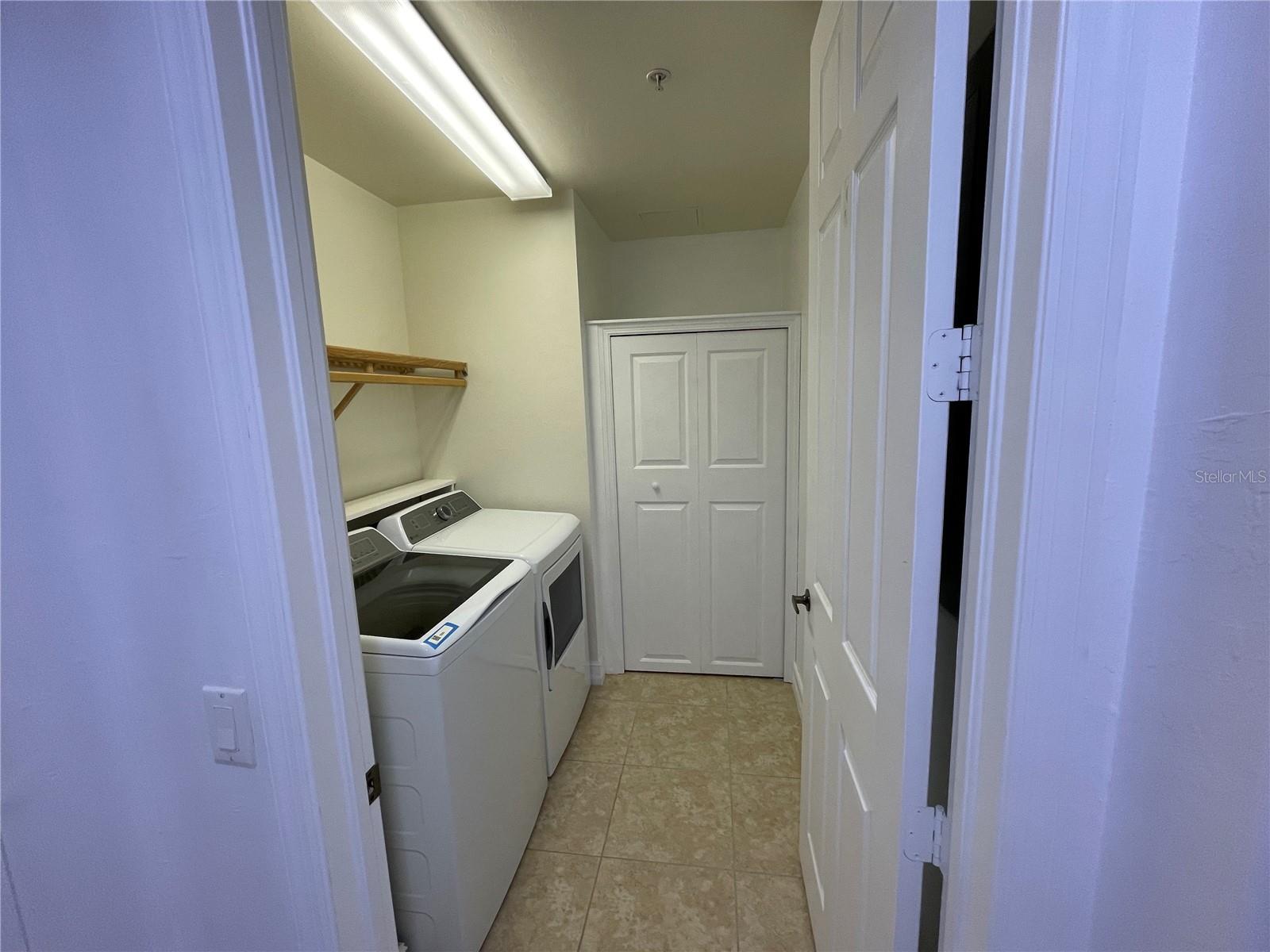 Laundry room with closet - 85 VIVANTE BLVD #8534, PUNTA GORDA