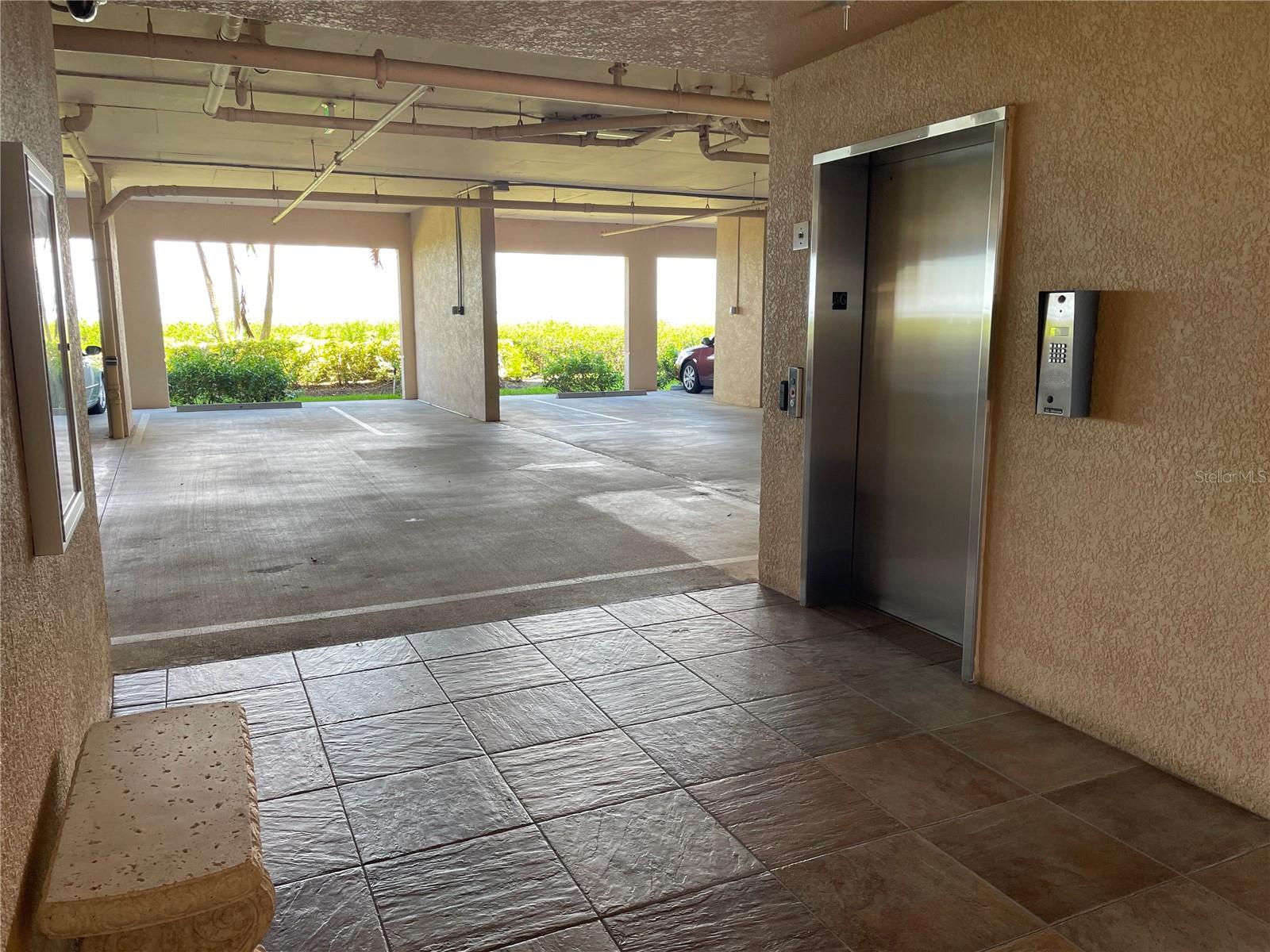 The parking space is directly across from the garage. There is additional storage in the parking area. - 85 VIVANTE BLVD #8534, PUNTA GORDA