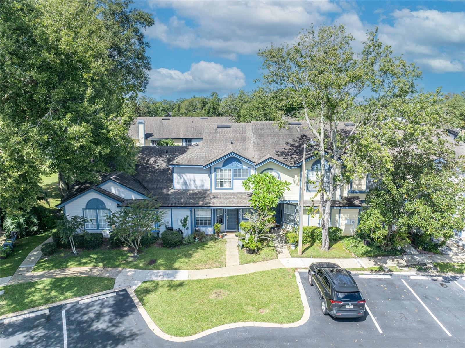 Well treed lot and a five-year-old roof. - 2810 CORNERSTONE CT, APOPKA