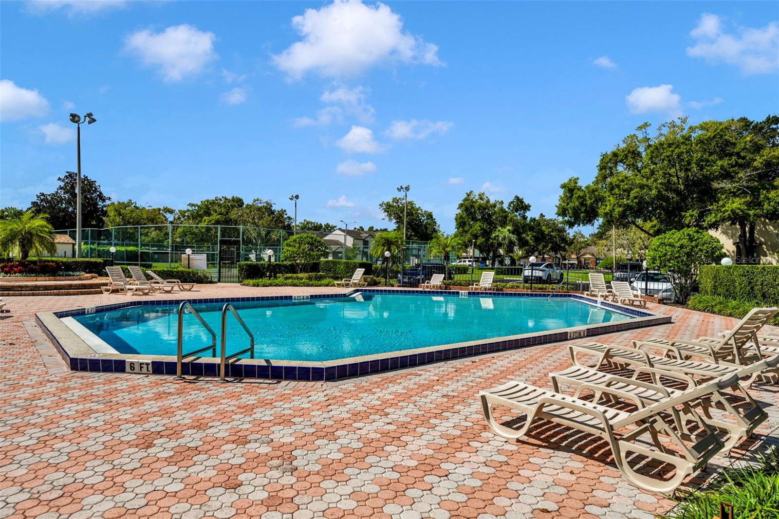 Plenty of chaise lounge chairs where you can live the good life. - 2810 CORNERSTONE CT, APOPKA
