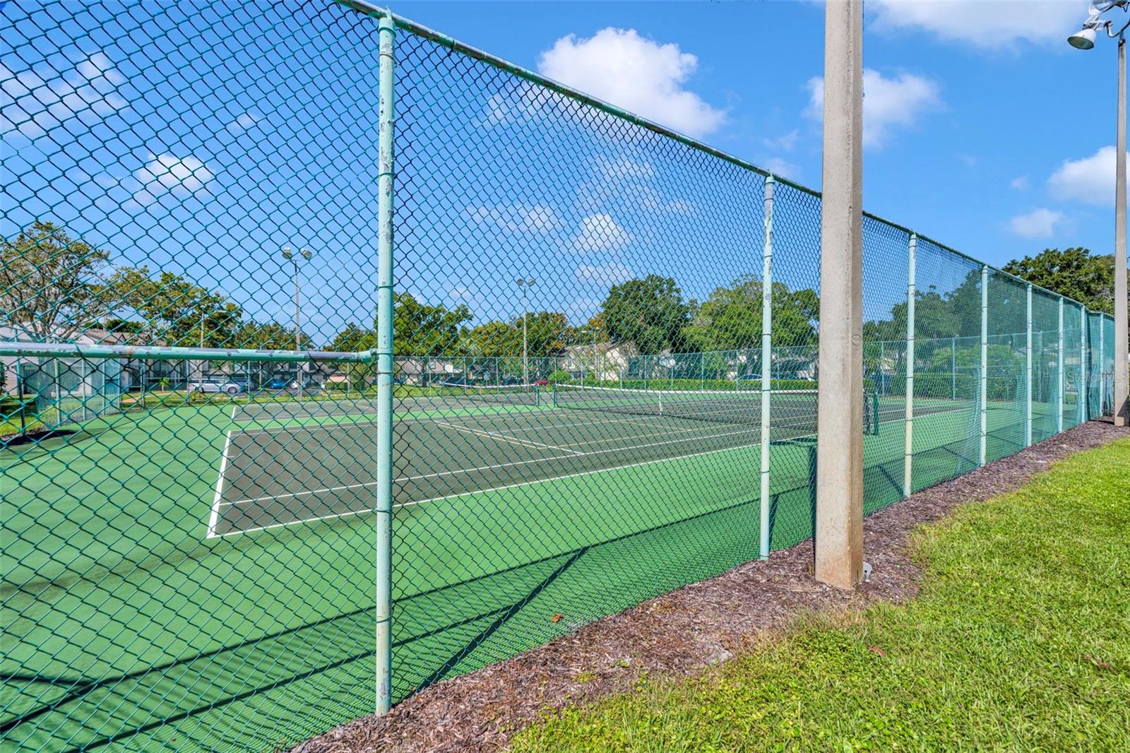 Next to the pool are the community tennis courts and you've got to LOVE that! - 2810 CORNERSTONE CT, APOPKA