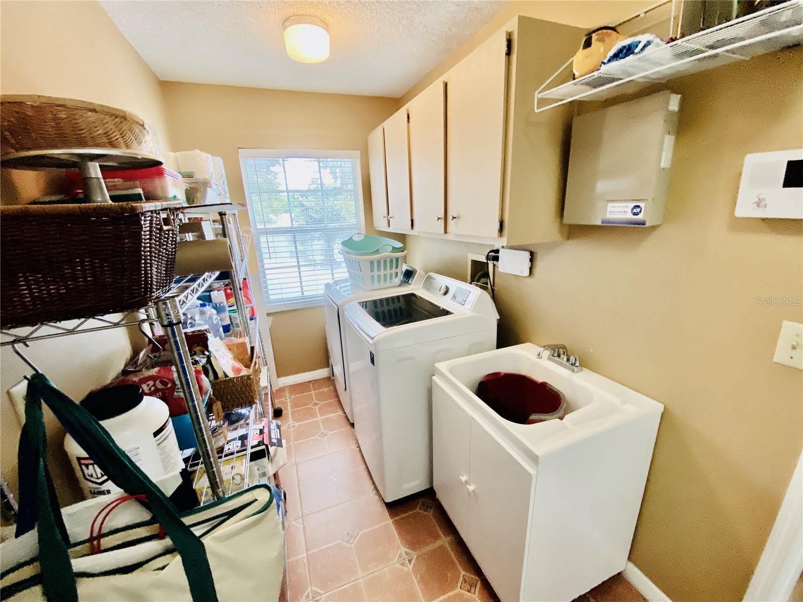 Inside Laundry, Washer, Dryer, Sink, & Cabinets - 1449 ERROL PKWY, APOPKA