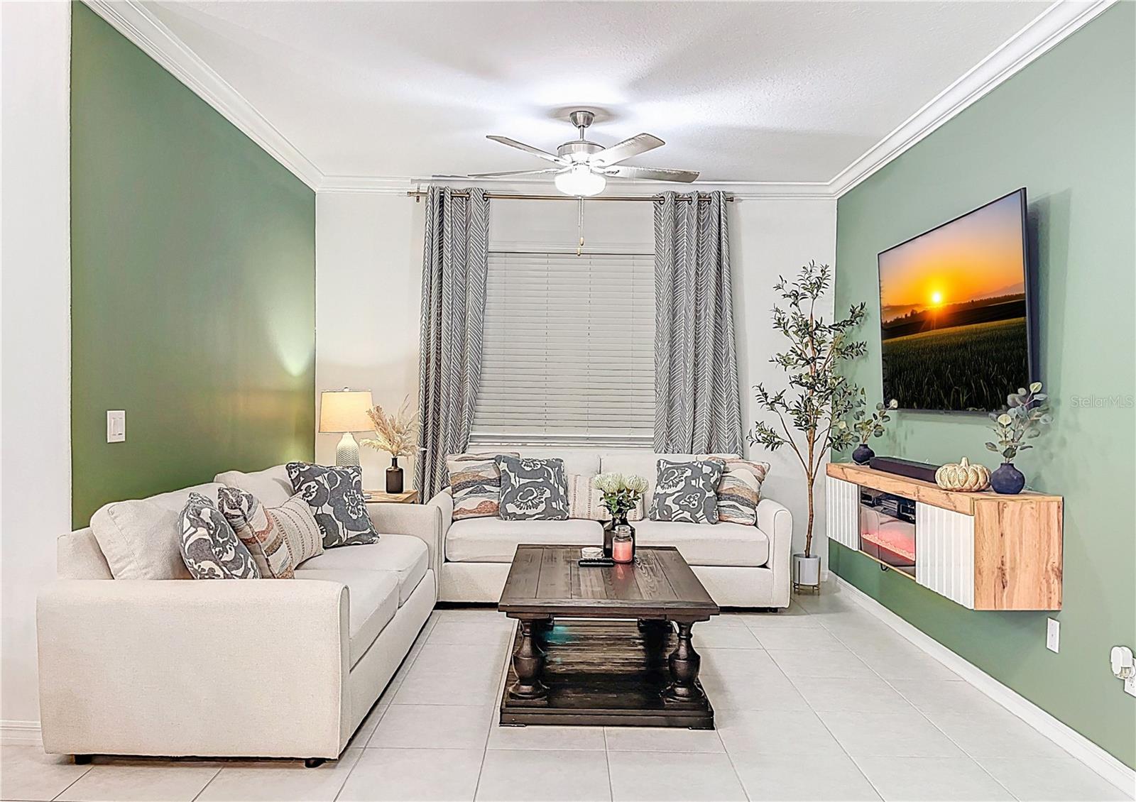 Living room, built in electric fireplace - 7082 RIPPLE POND LOOP, ZEPHYRHILLS