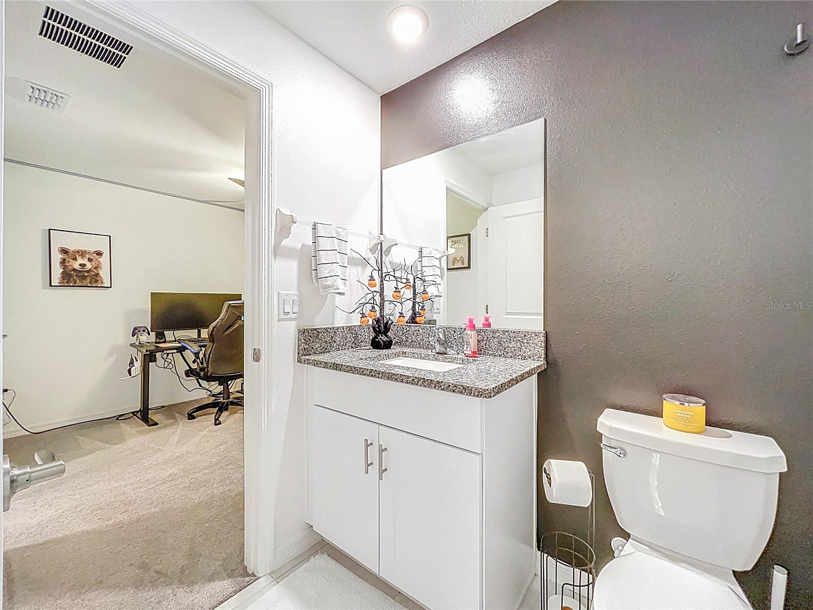 Jack and Jill Bathroom between bedroom 2 & 3 - 7082 RIPPLE POND LOOP, ZEPHYRHILLS