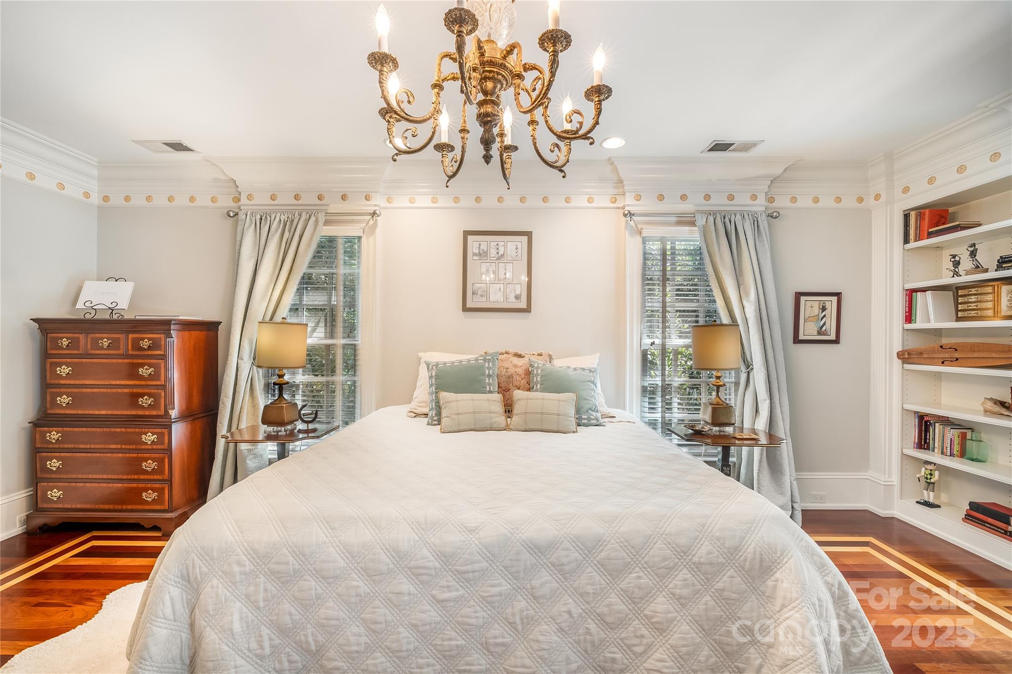 The second primary ensuite is also flooded with natural light and access to the second level covered porch. Stunning custom mahogany walk in closet is a must see. - 2665 Rolling Hills Drive, Monroe