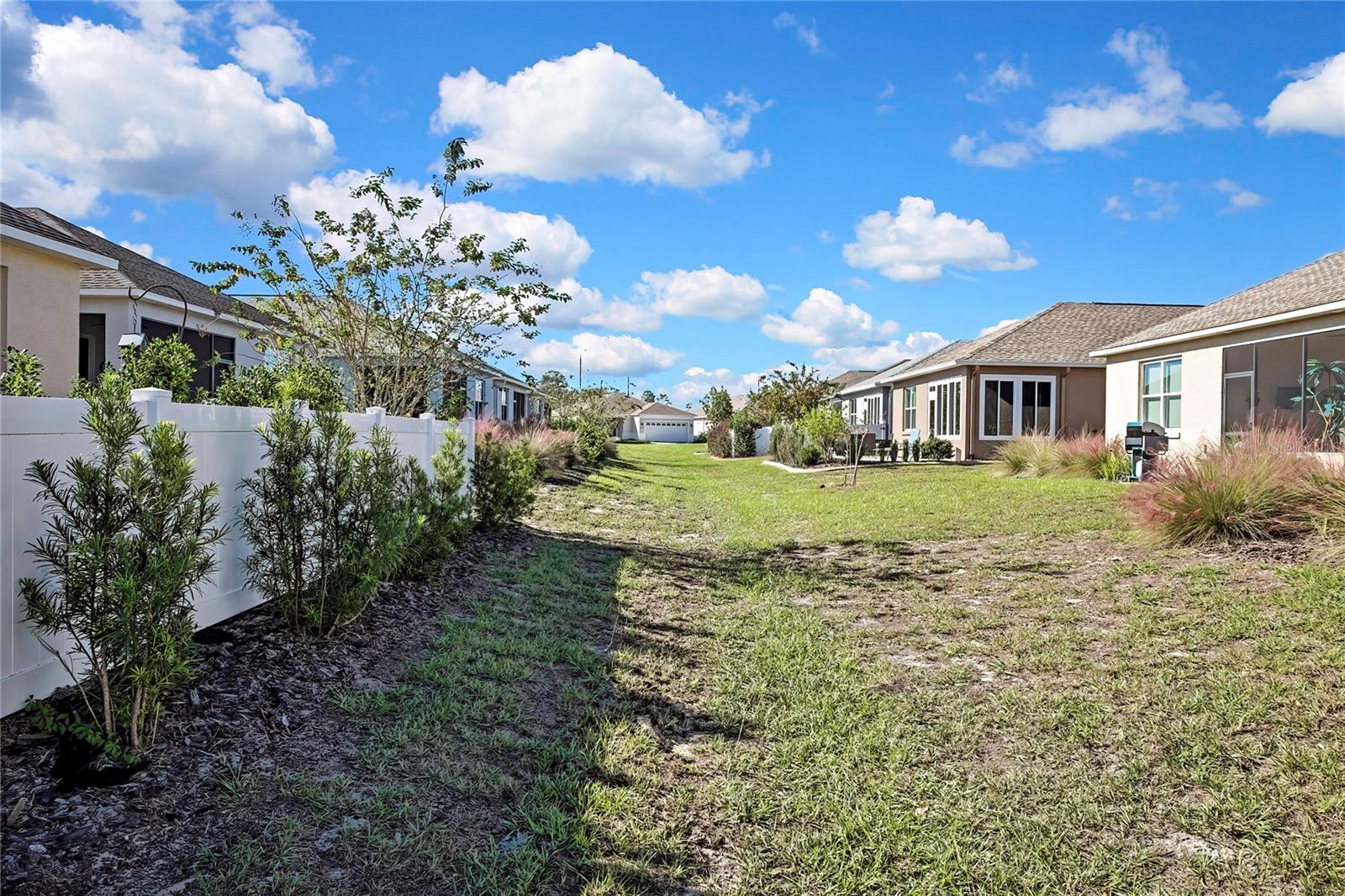 outside view beyond fence - 9764 SW 100TH AVENUE RD, OCALA