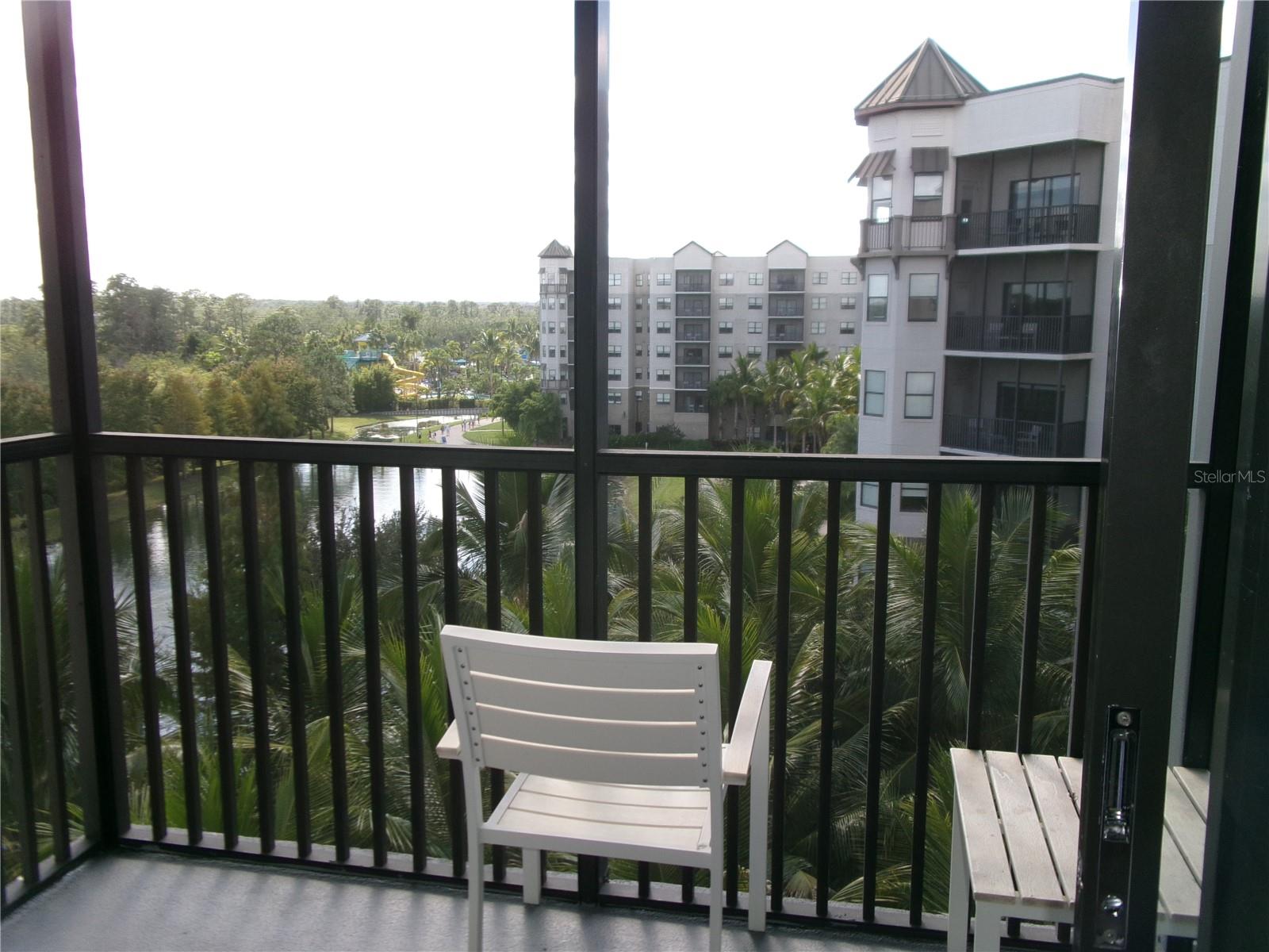 Relaxing view of the lake and water park beyond - 14501 GROVE RESORT AVE #1612, WINTER GARDEN