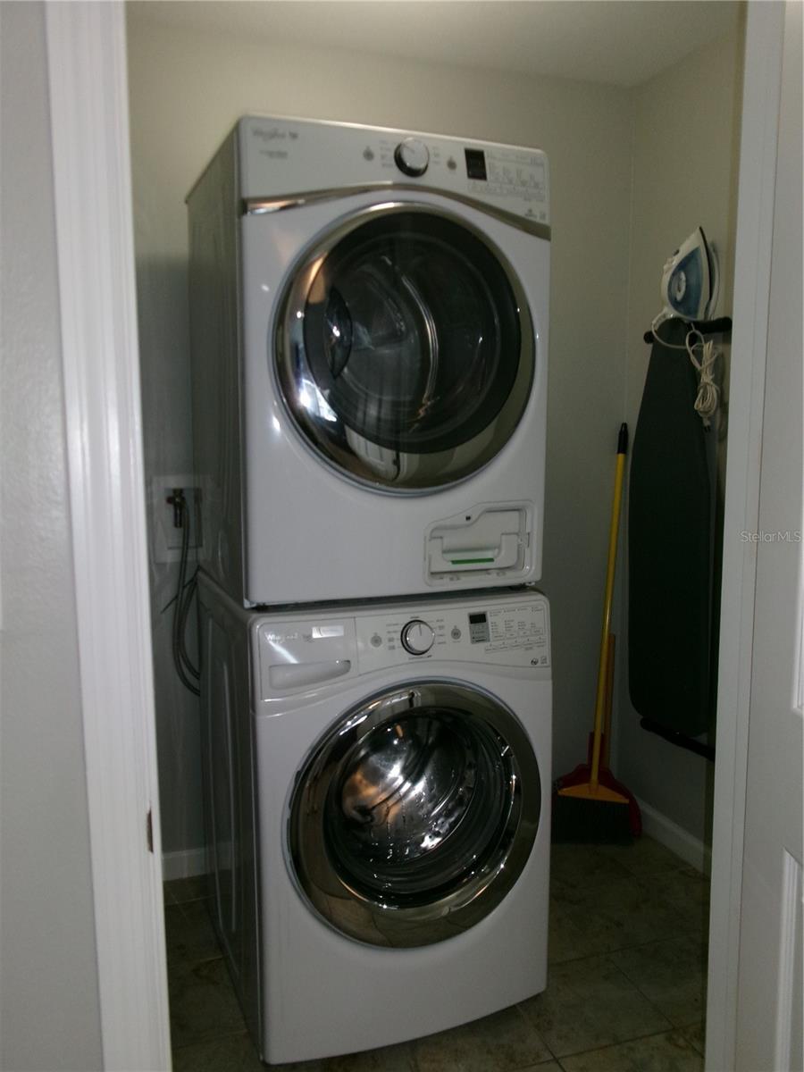 Laundry room with storage - 14501 GROVE RESORT AVE #1612, WINTER GARDEN