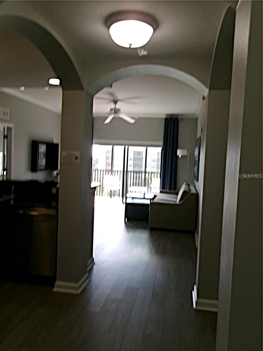 View from entry to your unit. Nice flooring, and open concept living - 14501 GROVE RESORT AVE #1612, WINTER GARDEN