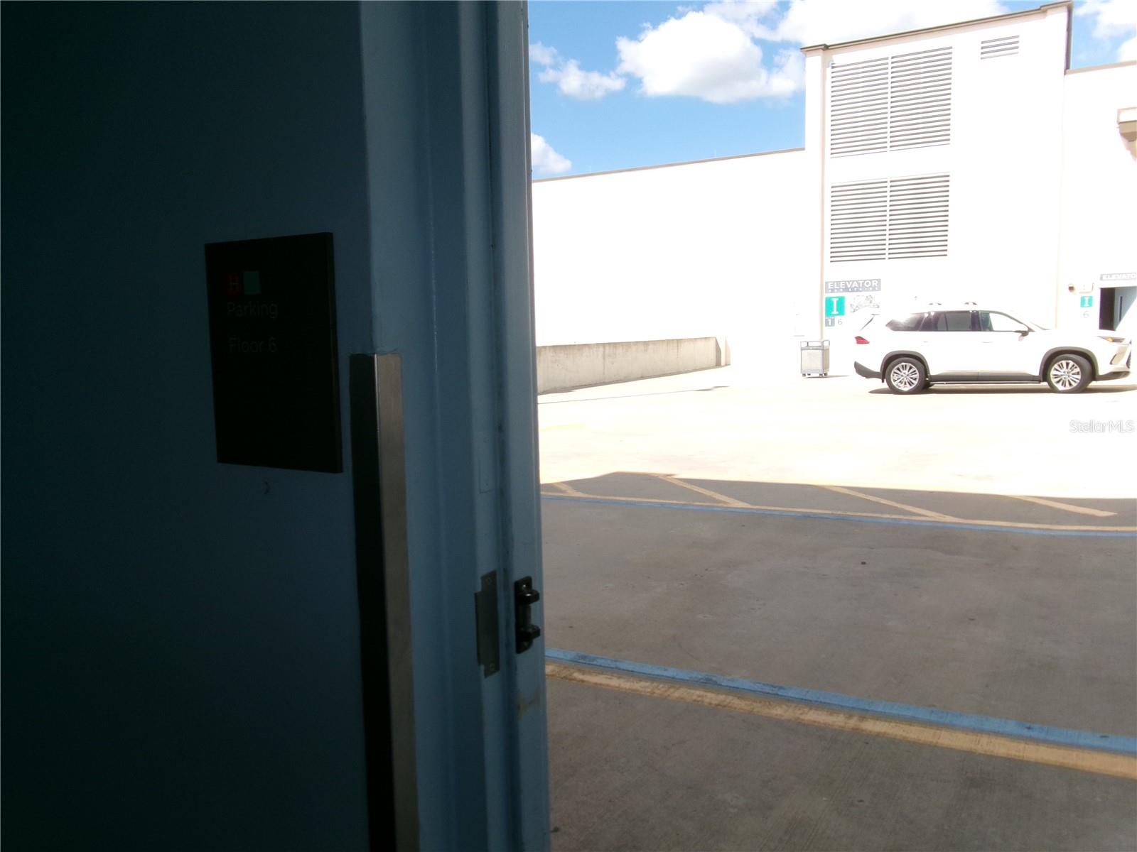 The garage is a short walk to this unit - 14501 GROVE RESORT AVE #1612, WINTER GARDEN