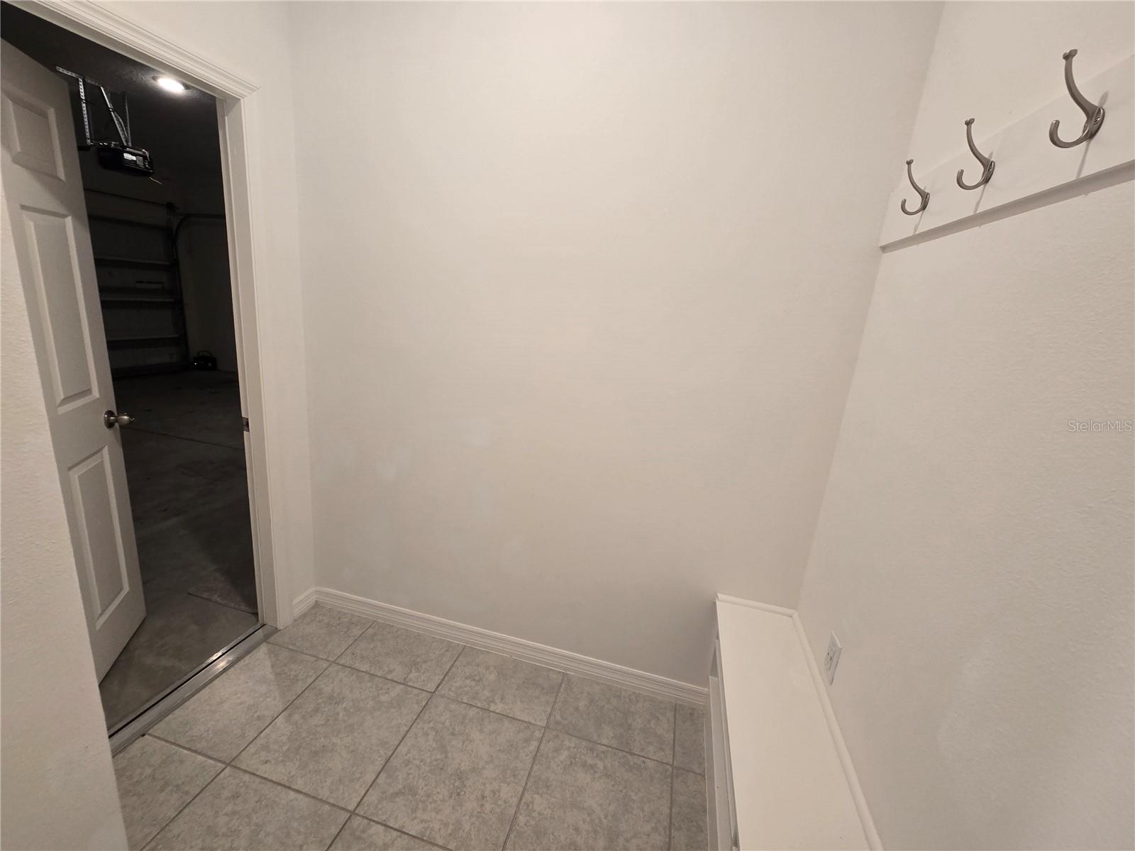 Laundry Room goes out to garage - 1225 TUPELO TRL, HAINES CITY