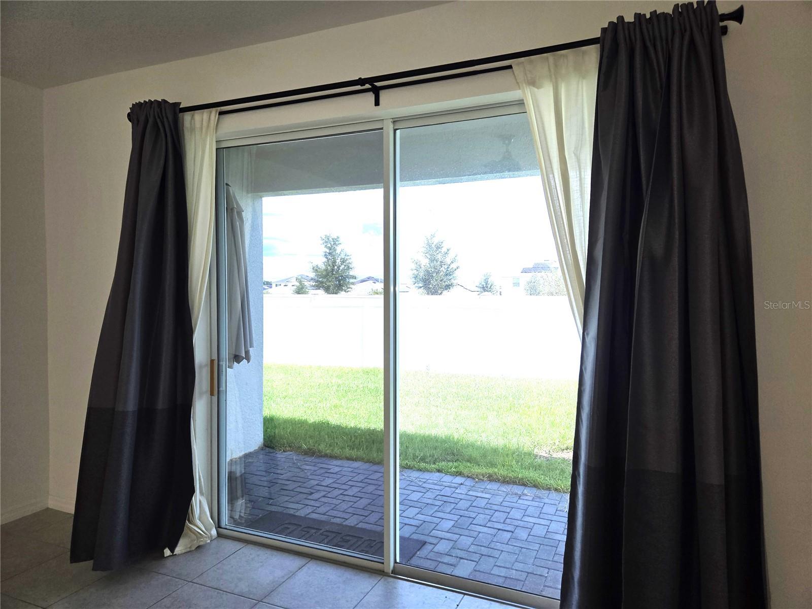 Great room sliding doors to back yard - 1225 TUPELO TRL, HAINES CITY