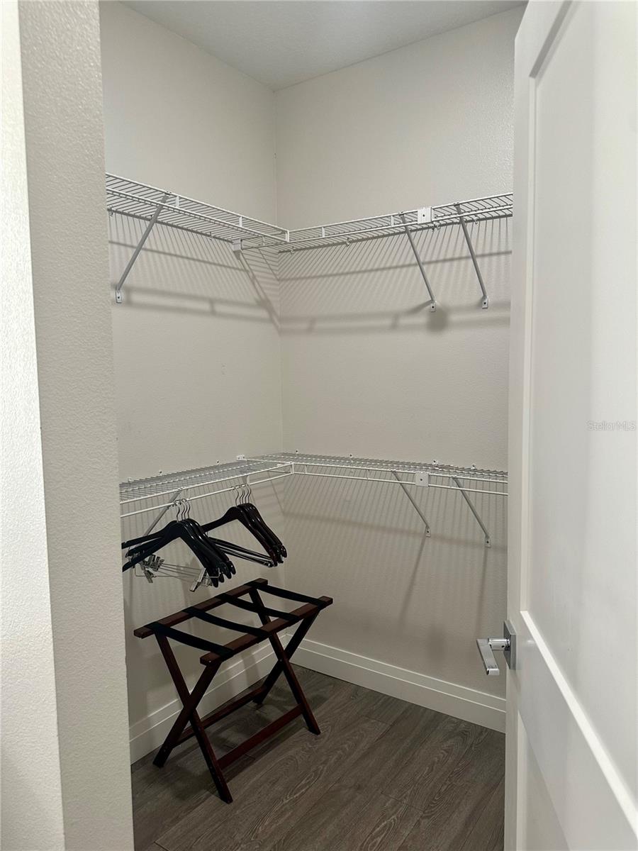 2nd Primary Bedroom Walk-in Closet - 14501 GROVE RESORT AVE #2101, WINTER GARDEN