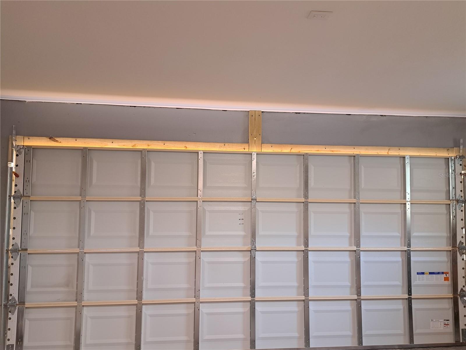 New garage door in finishing process - 26 CLINTWOOD AVE, ENGLEWOOD