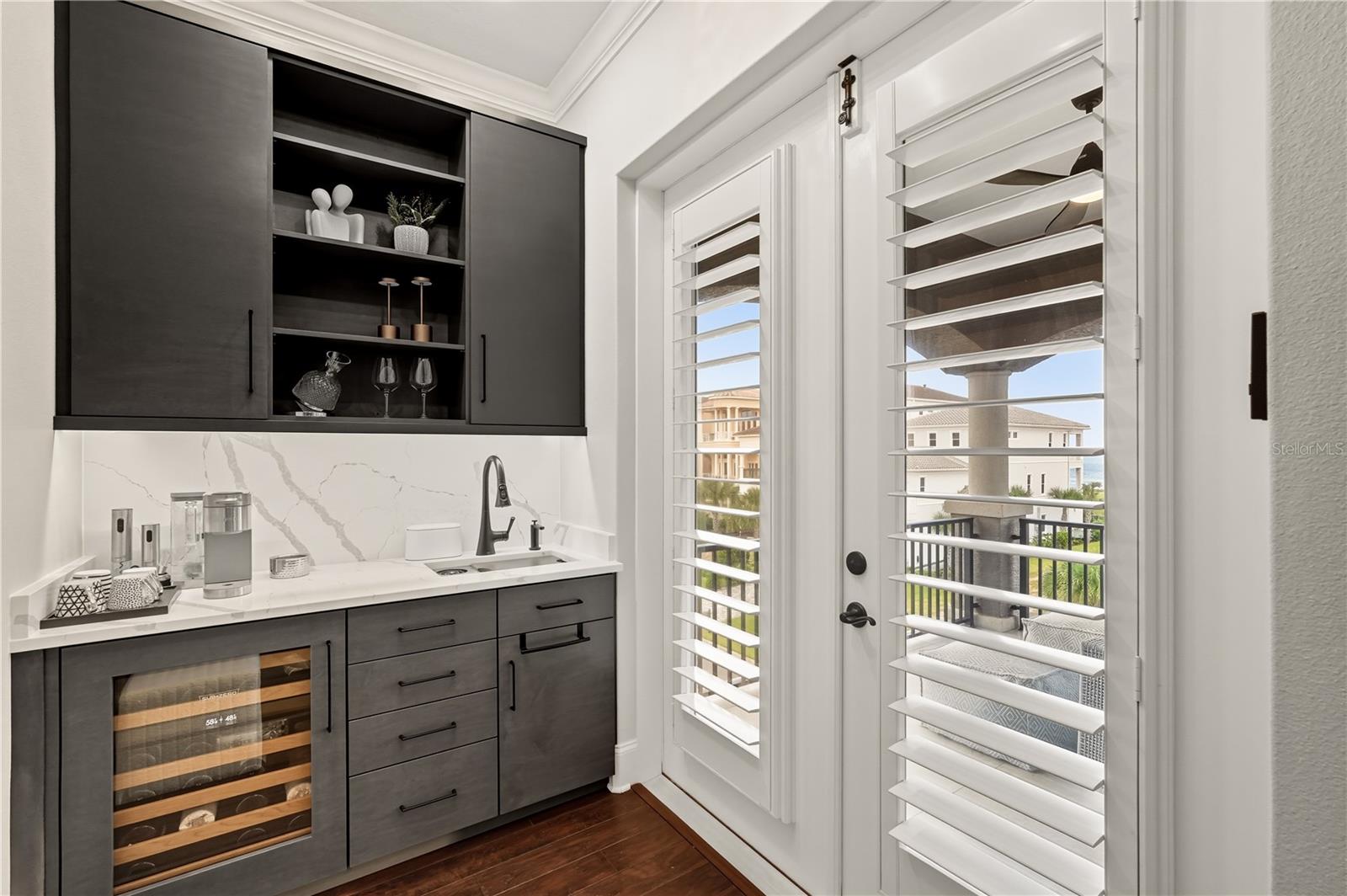 Master bedroom wet bar with Subzero wine cooler - 355 OCEAN CREST DR, PALM COAST