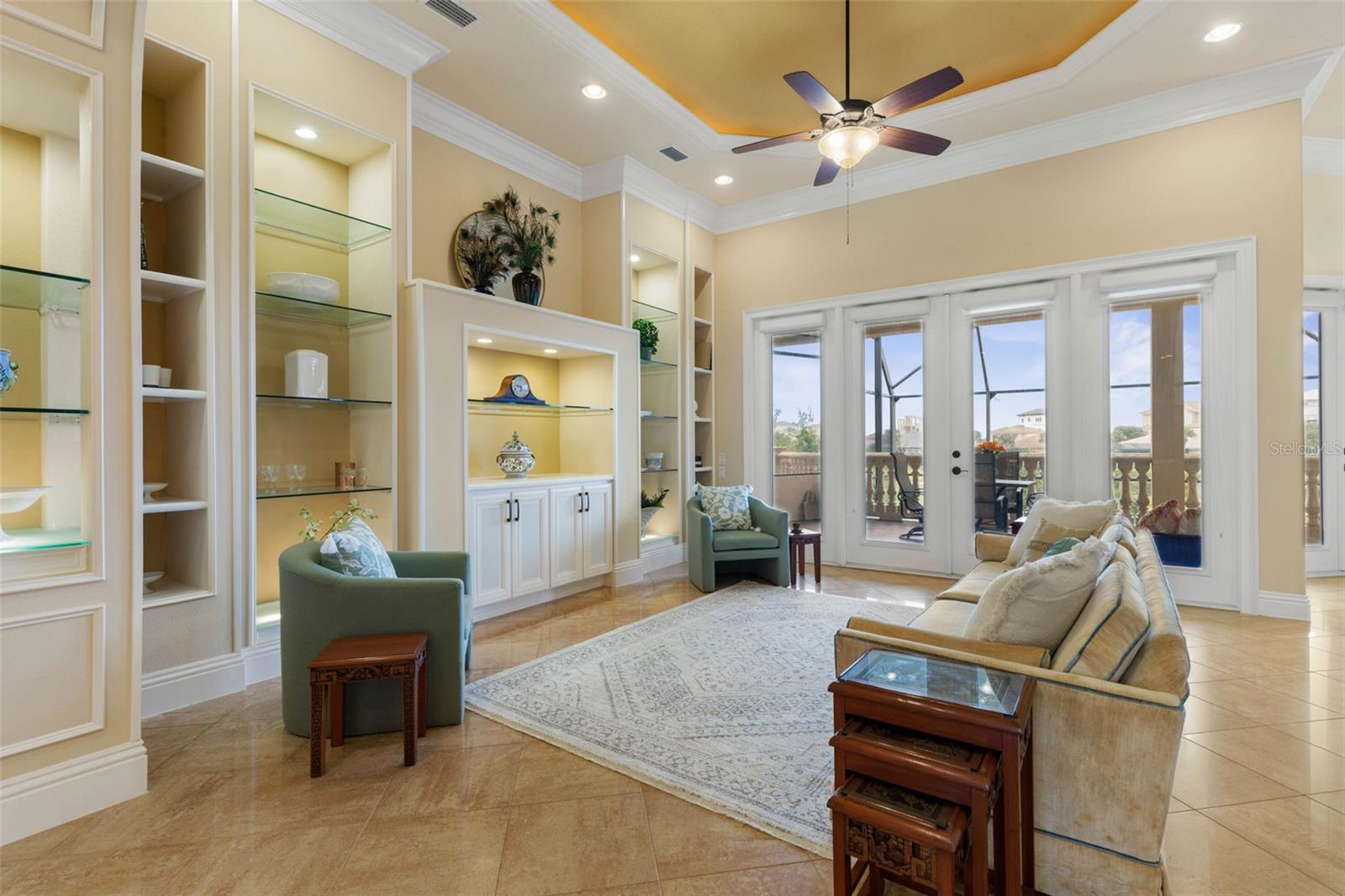 Living Room with custom cabinetry and lit built-ins - 44 OCEAN OAKS LN, PALM COAST