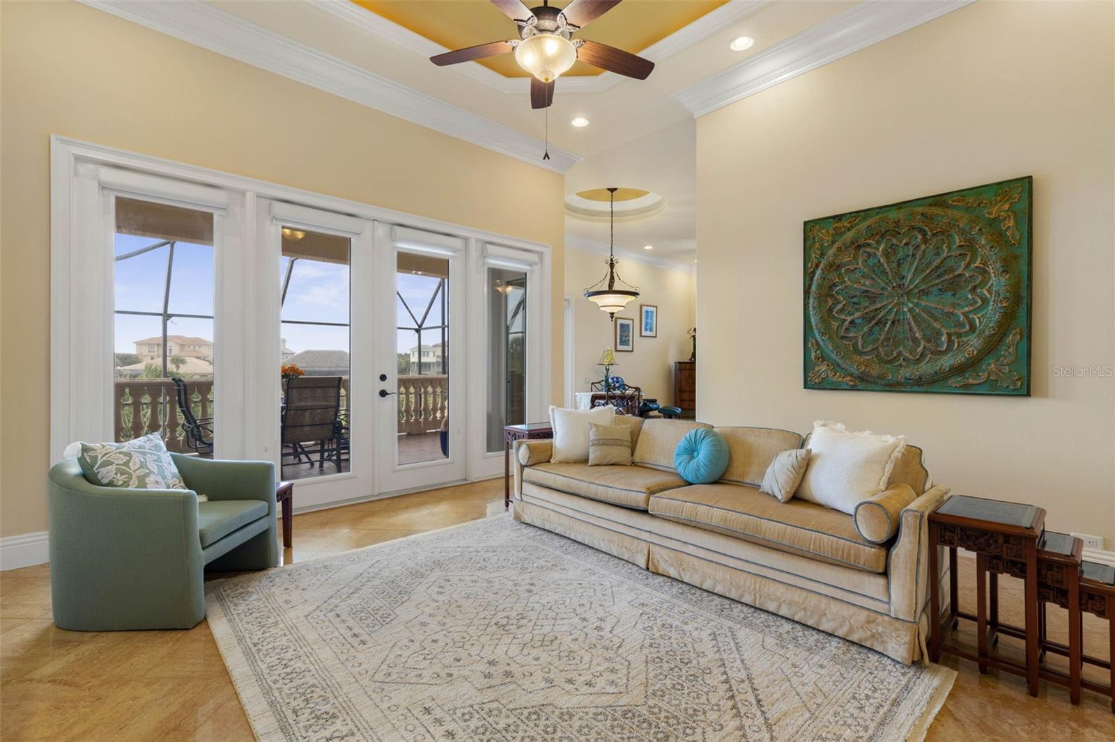 Family room with french doors leading out to outside lanai - 44 OCEAN OAKS LN, PALM COAST