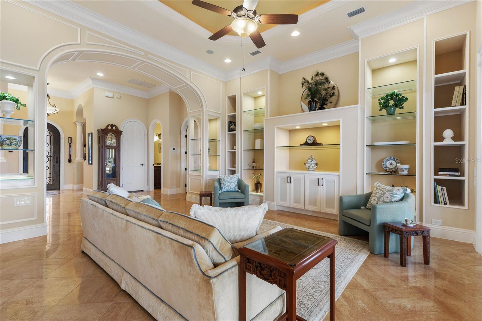 Living Room with custom cabinetry and lit built-ins - 44 OCEAN OAKS LN, PALM COAST