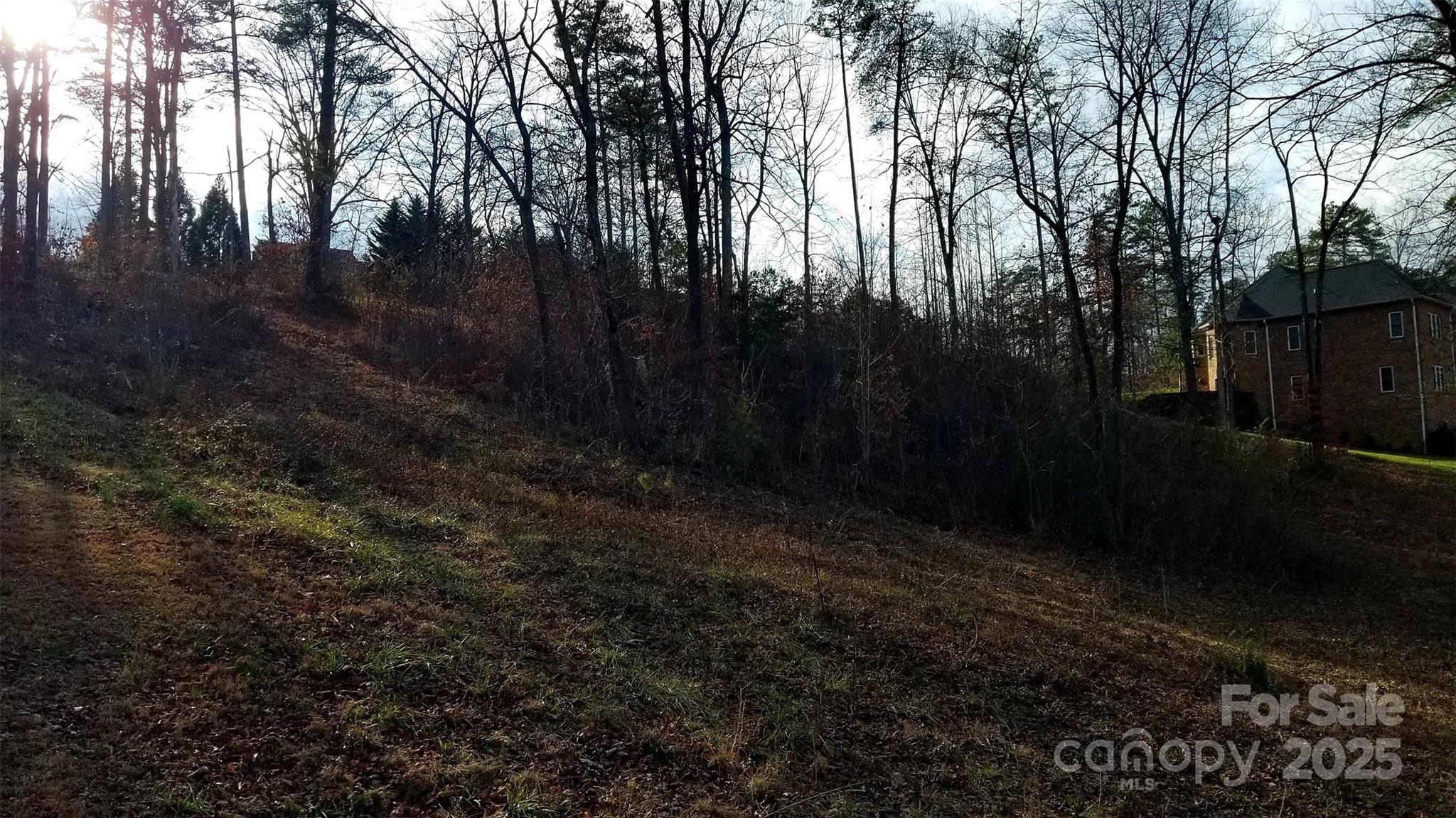 .91 acre cul-de-sac lot 124 with sloping topography conducive to a basement foundation plan overlooking the golf course - 4269 Aaron Court, Morganton
