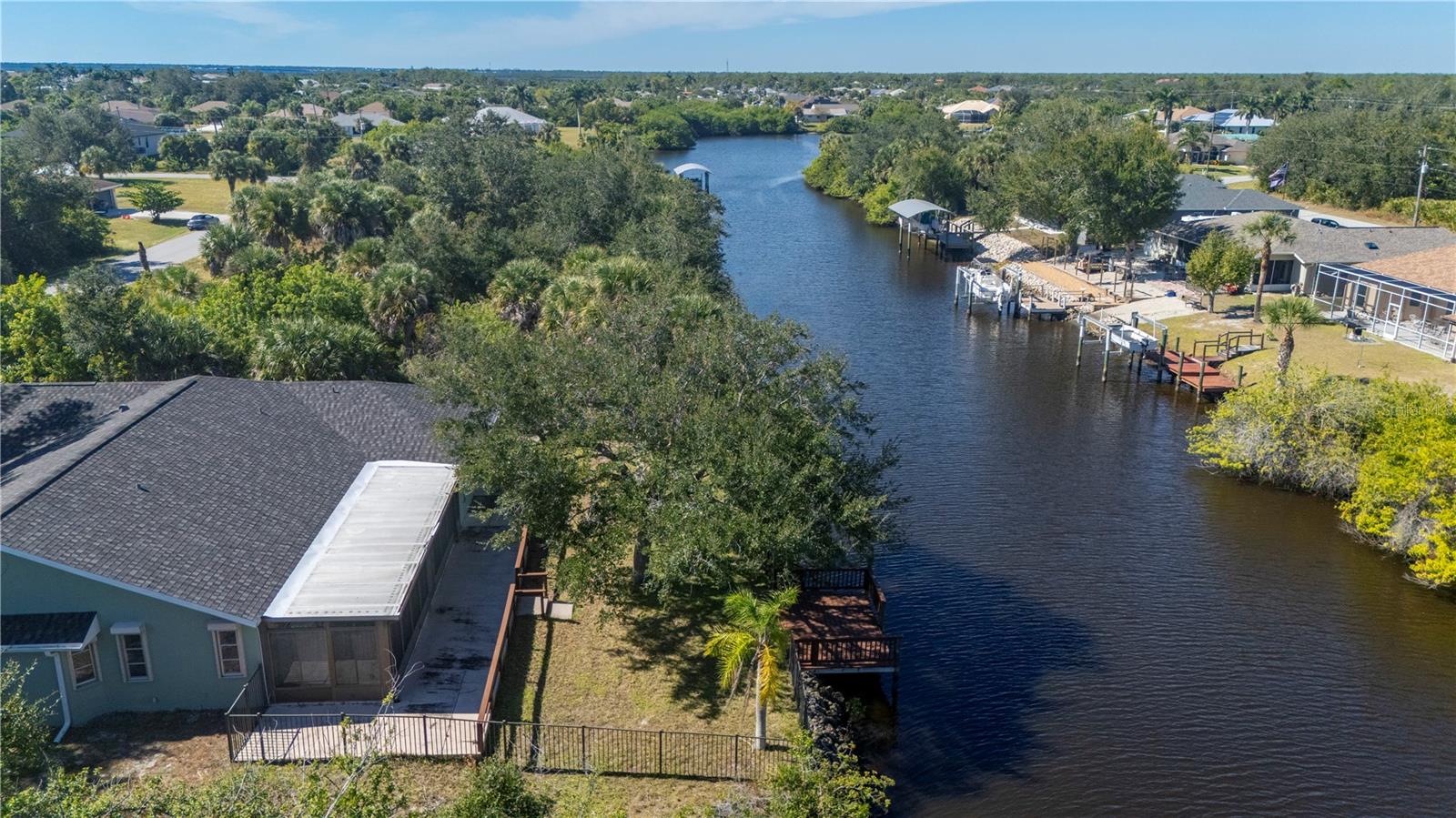 Boat your way down this canal, turn left, go under one bridge and take in the beauty of the Manchester Waterway on your way to the harbor. - 17356 GULFSPRAY CIR, PORT CHARLOTTE