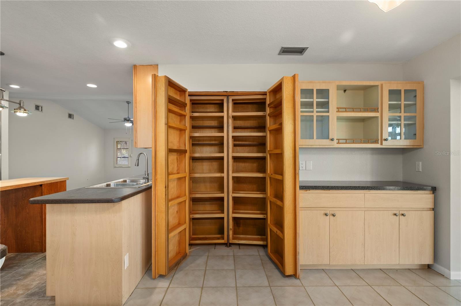 Exceptional built-in pantry and storage. - 17356 GULFSPRAY CIR, PORT CHARLOTTE