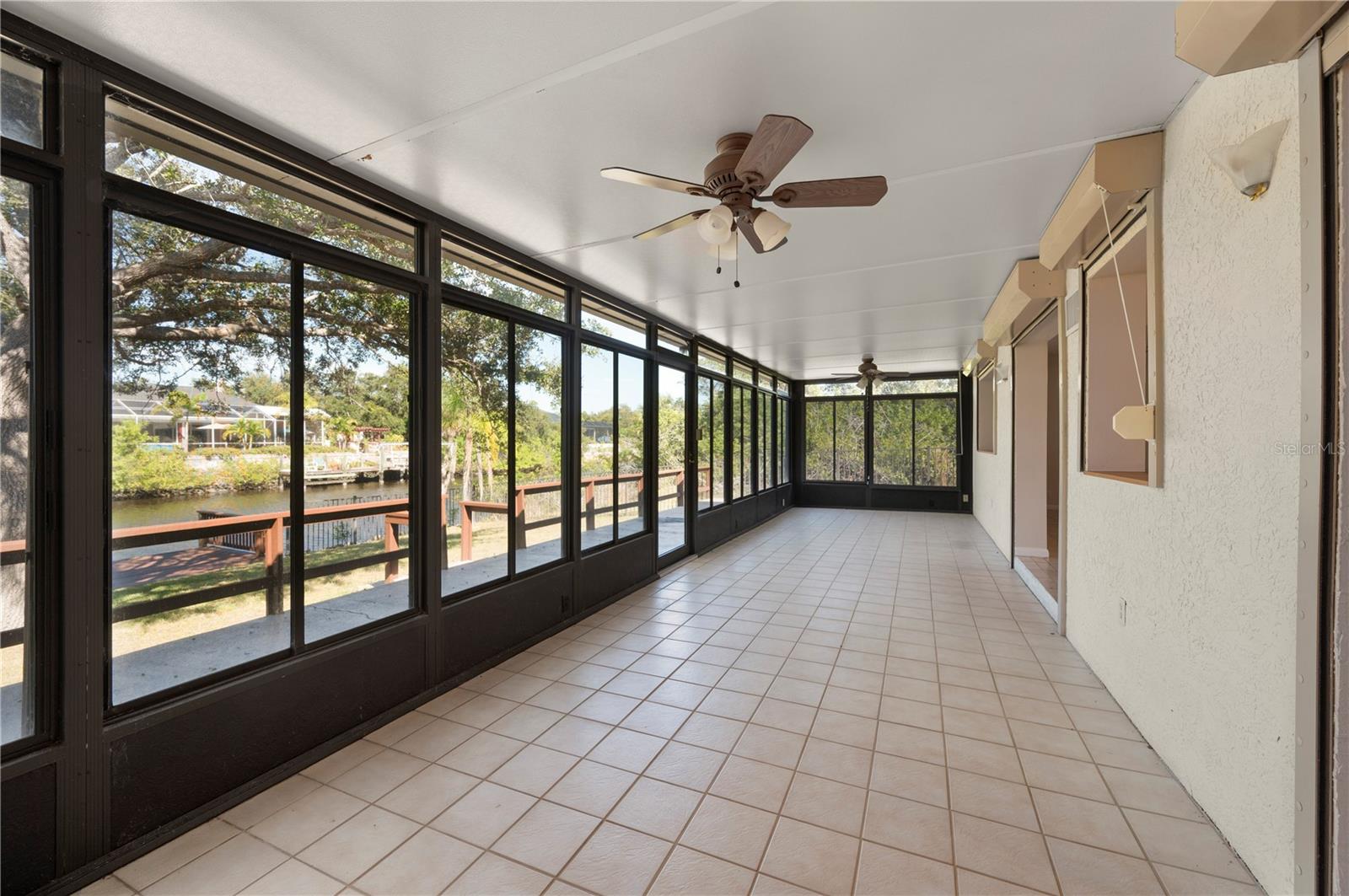 Sun Room or call it your waterfront Florida Room. - 17356 GULFSPRAY CIR, PORT CHARLOTTE