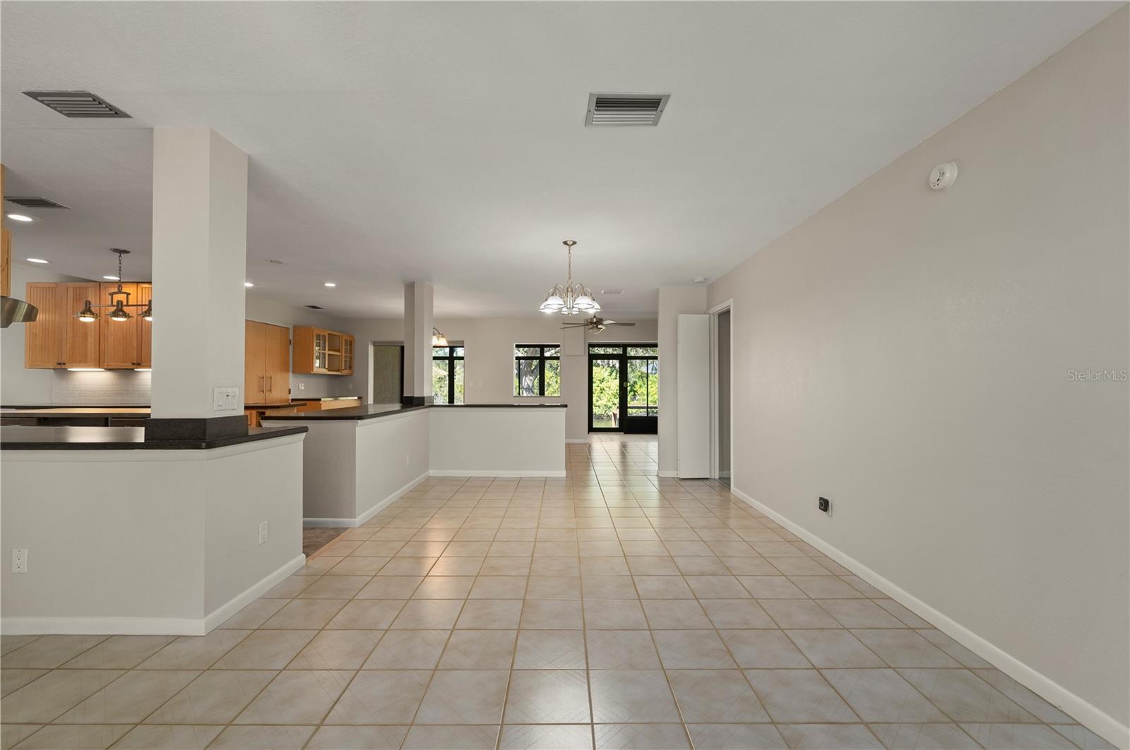 So much room from living room to kitchen, to bonus room to Florida Room to waterfront. - 17356 GULFSPRAY CIR, PORT CHARLOTTE
