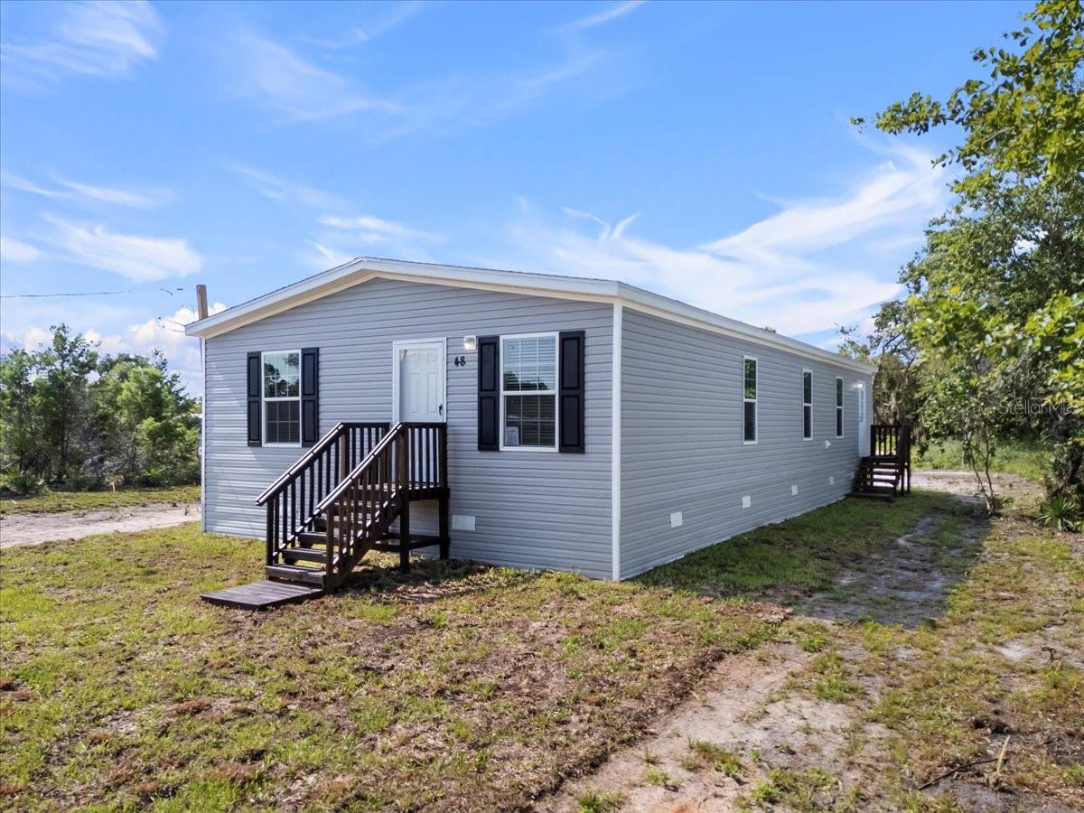 Manufactured Home at 21351 CANAL DR, BROOKSVILLE, photo 5 of 32