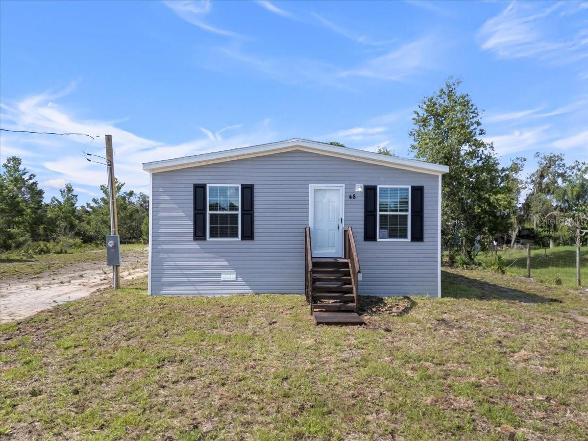 Manufactured Home at 21351 CANAL DR, BROOKSVILLE, photo 4 of 32