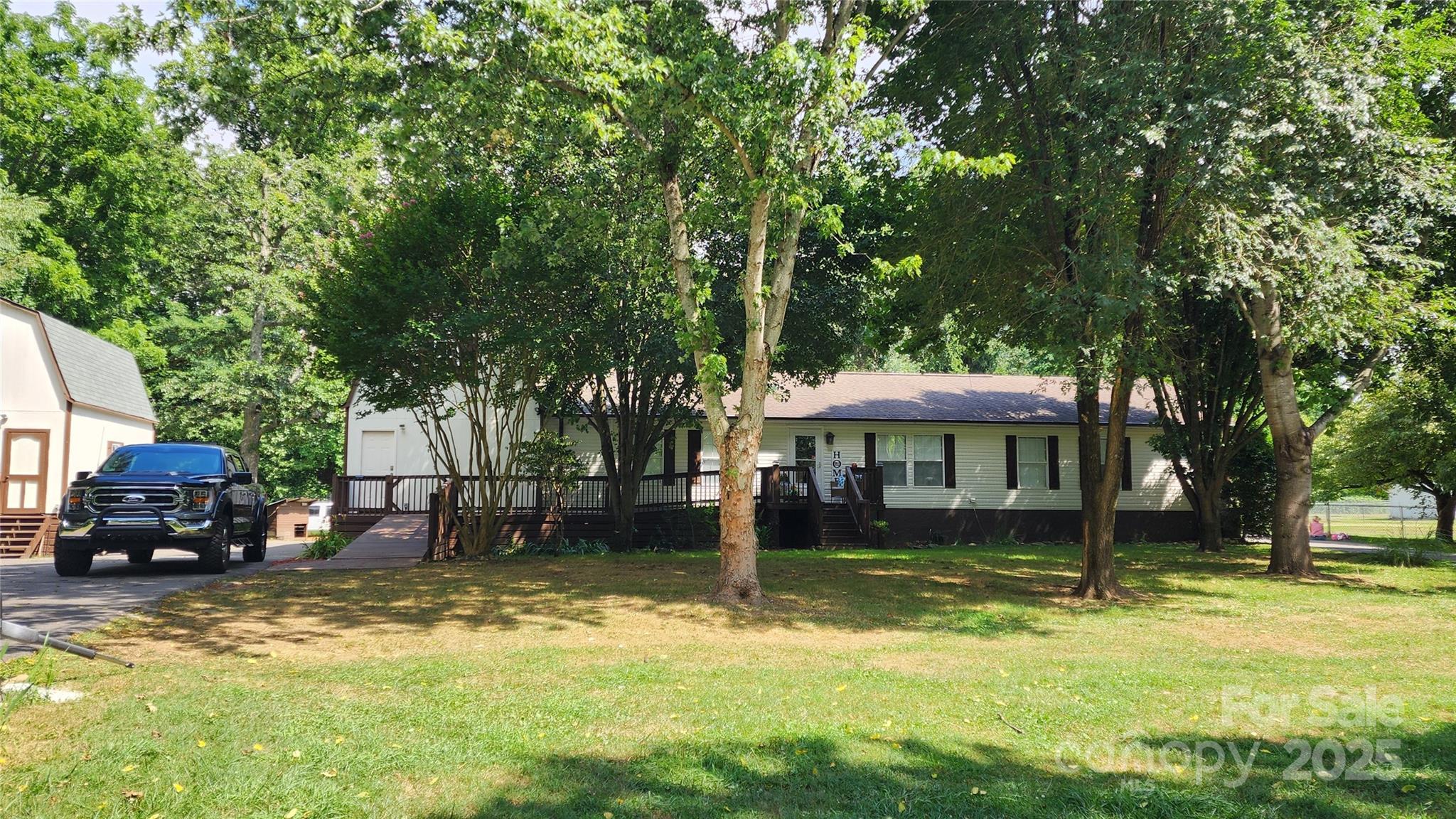 Single Family Residence at 1235 Sulphur Springs Road, Waynesville, photo 2 of 40