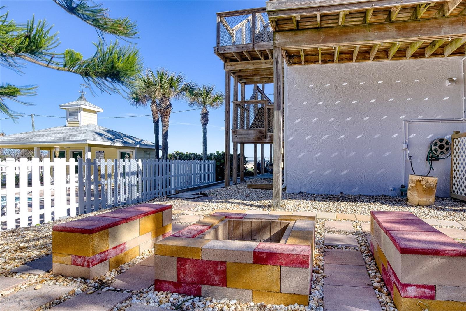 Backyard firepit - 6618 S ATLANTIC AVE, NEW SMYRNA BEACH