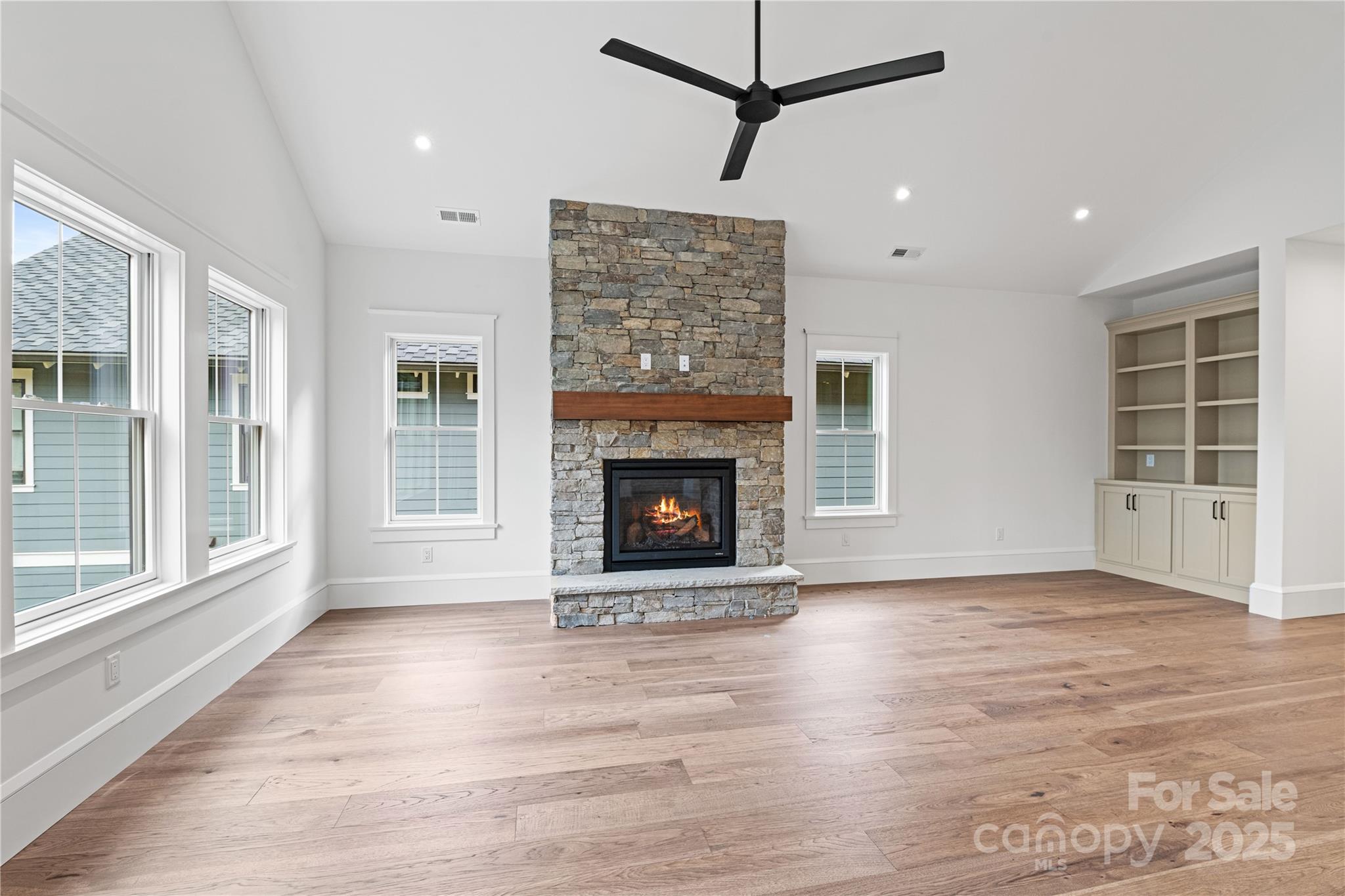 Living Room with Fireplace & Built-Ins - 127 Creekside Valley Lane, Arden