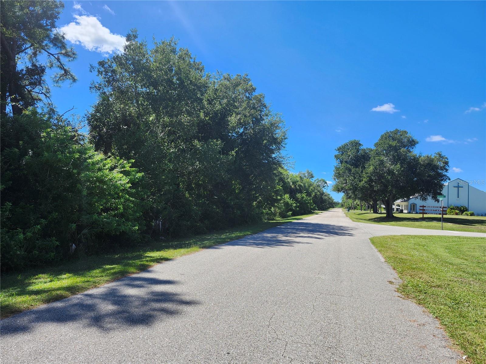 Lookin west - property on left side - 17517 ELMWOOD AVE, PORT CHARLOTTE