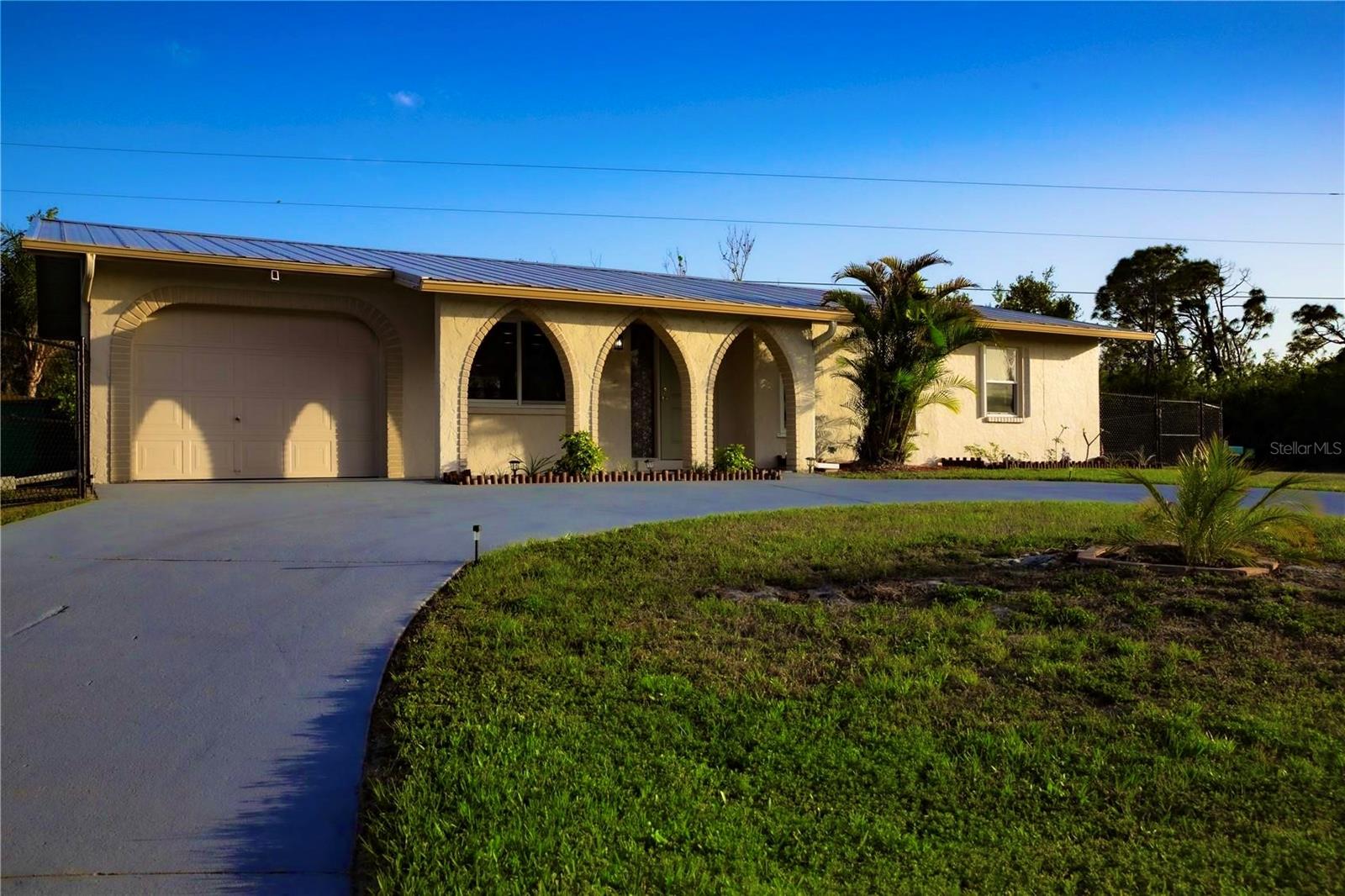 Single Family Residence at 389 MILLPORT ST NW, PORT CHARLOTTE, photo 2 of 29