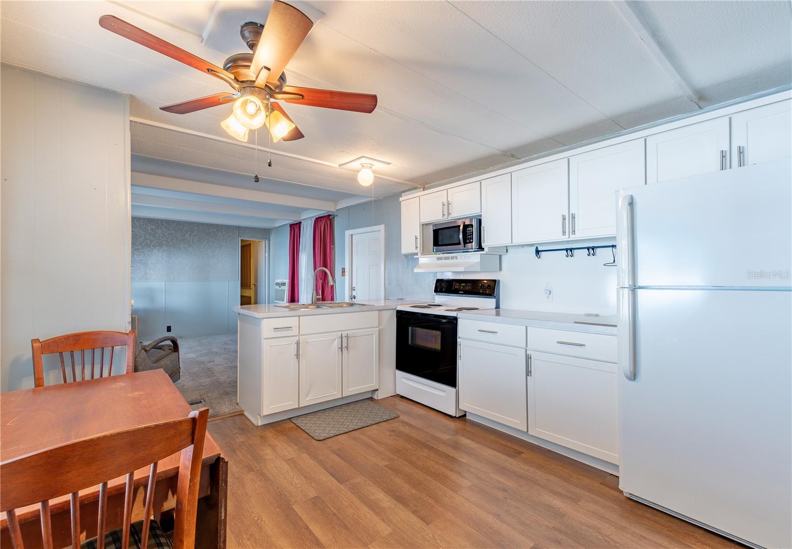 Mobile Home at 7139 EL CONQUISTADOR ST, ZEPHYRHILLS, photo 6 of 26