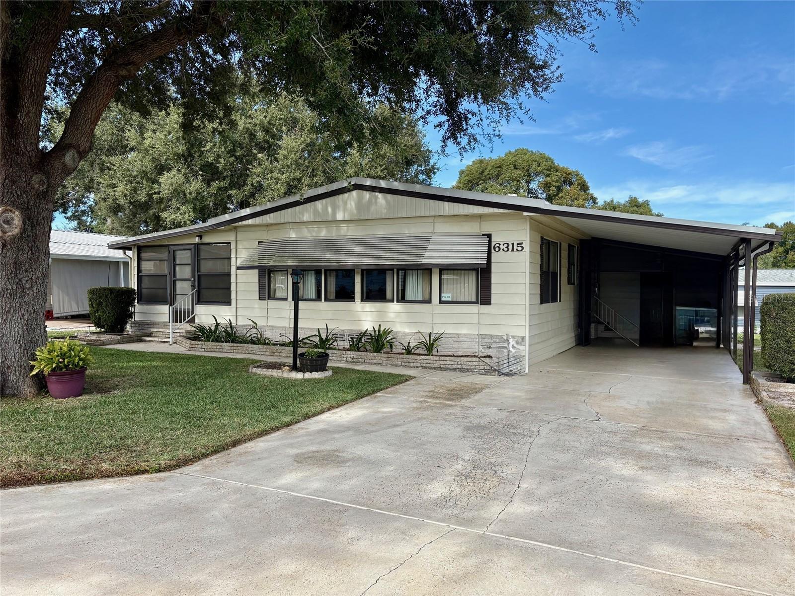 Manufactured Home at 6315 GROVE POINTE DR SE, WINTER HAVEN, photo 3 of 46