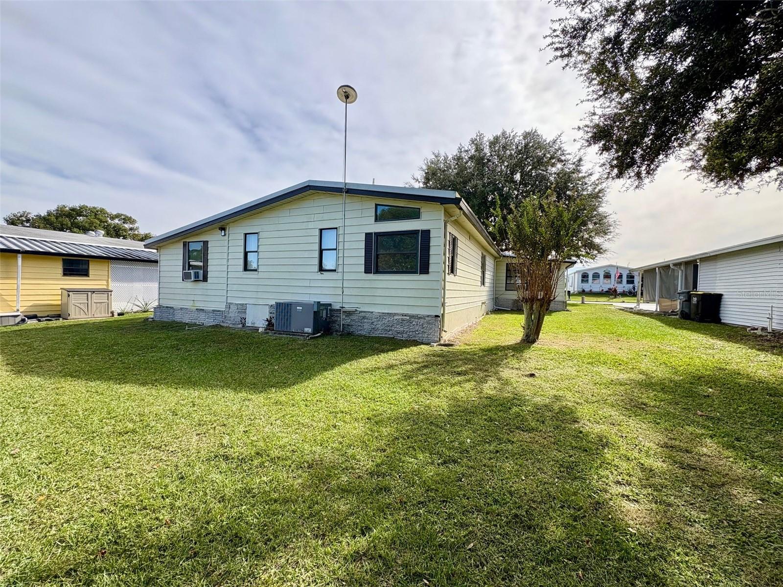 Back of house - 6315 GROVE POINTE DR SE, WINTER HAVEN